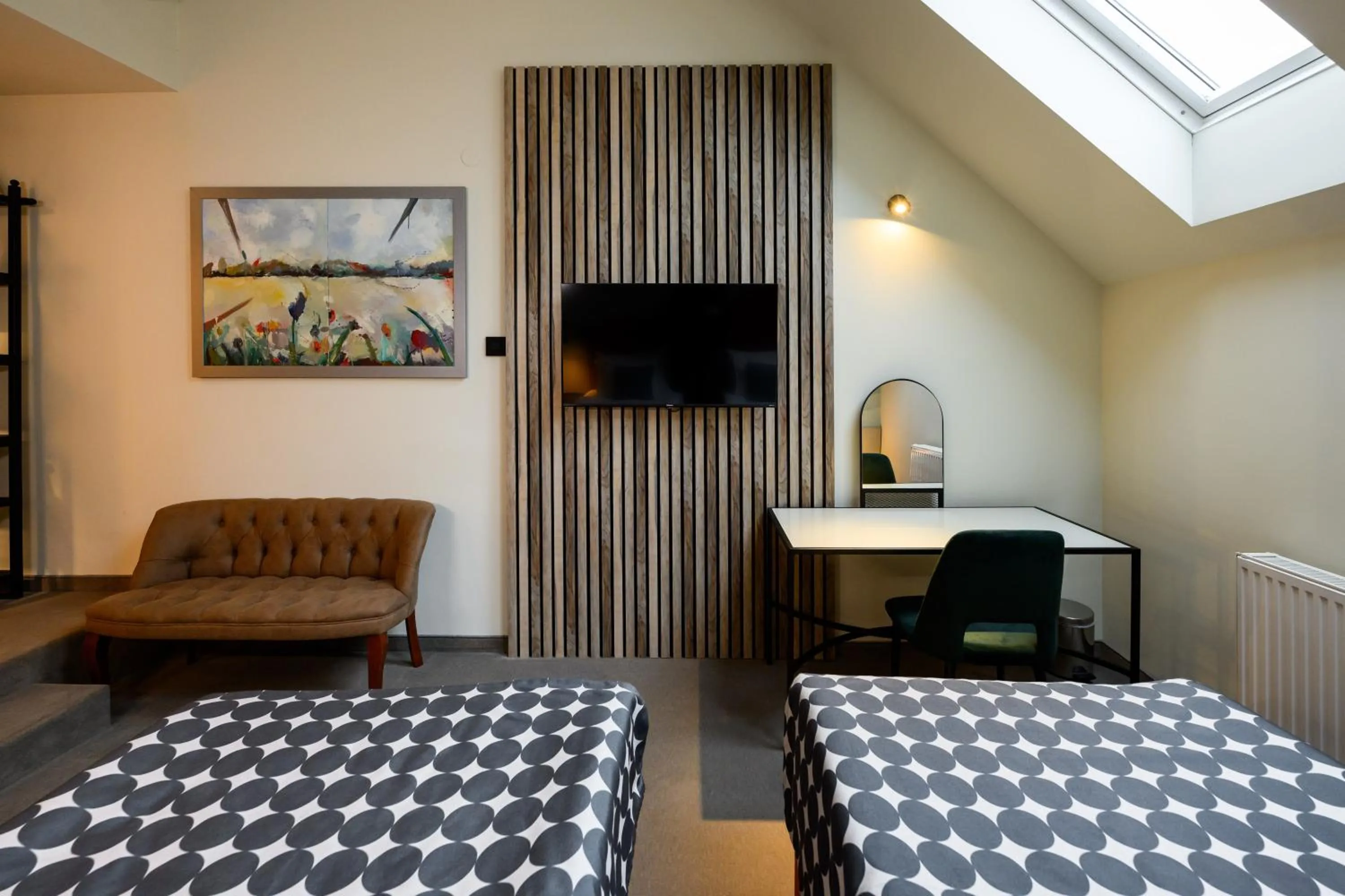 Bed in ArtLoft Garni Hotel