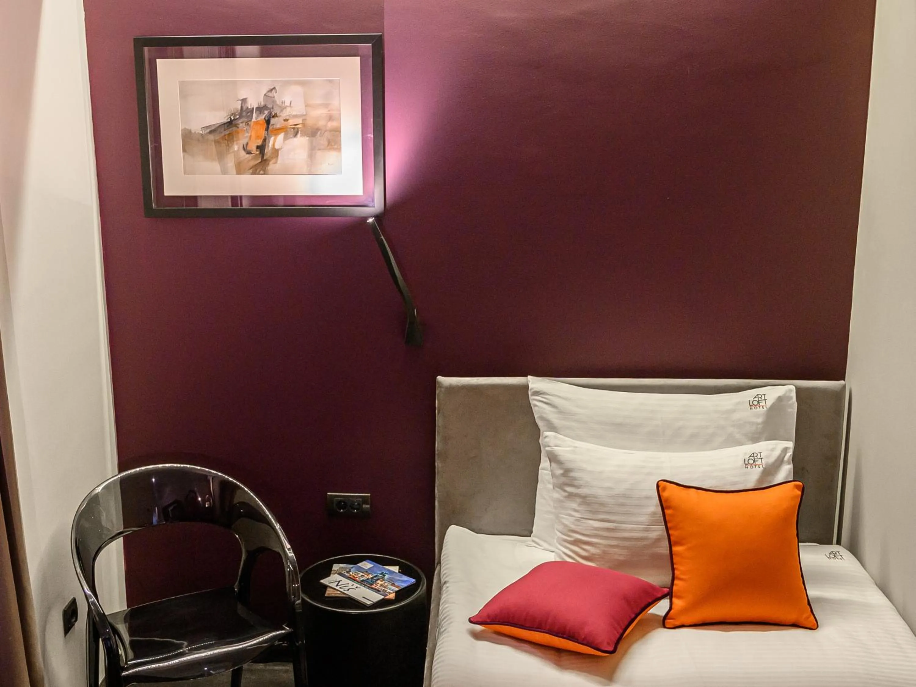 Bed in ArtLoft Garni Hotel