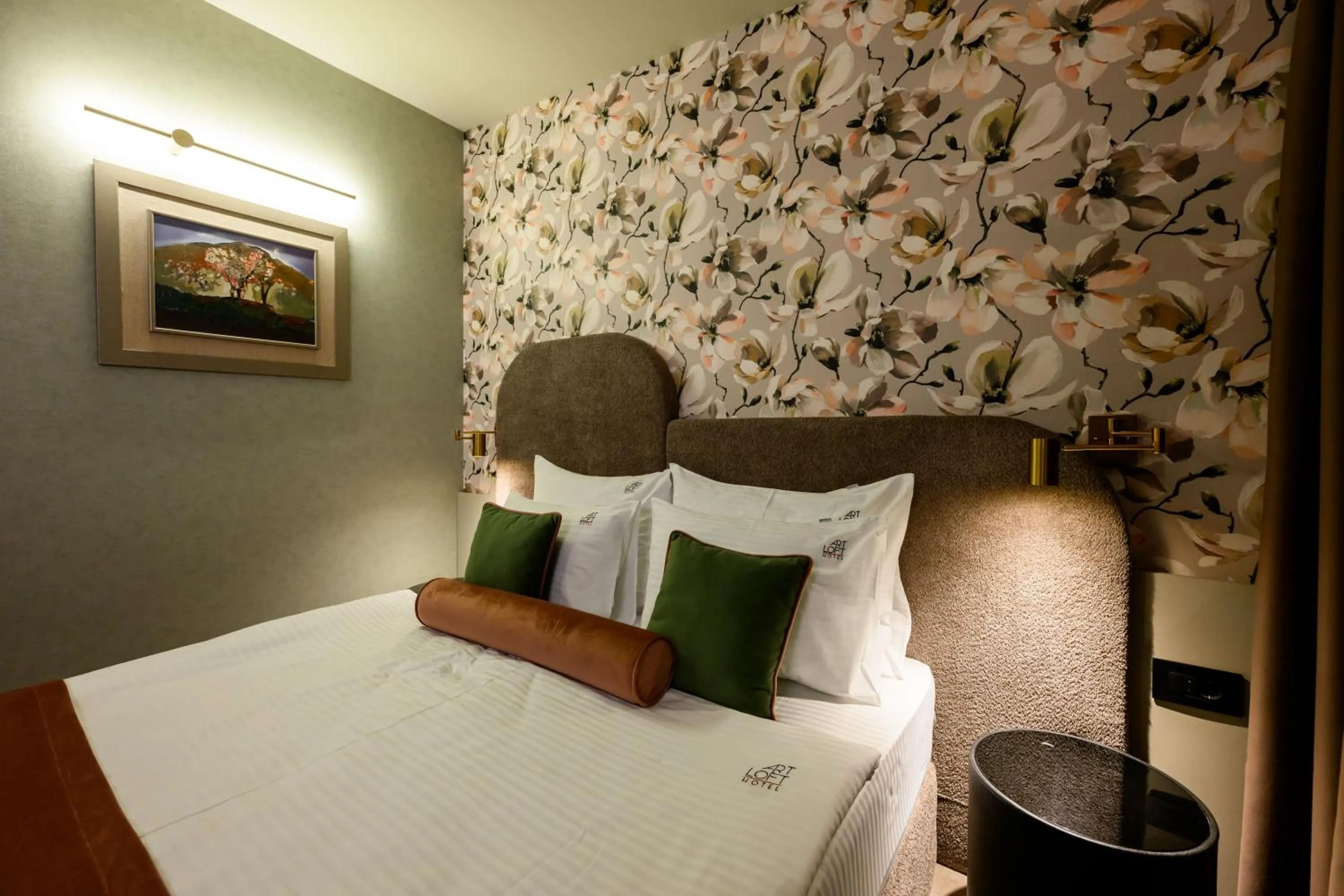 Bed in ArtLoft Garni Hotel