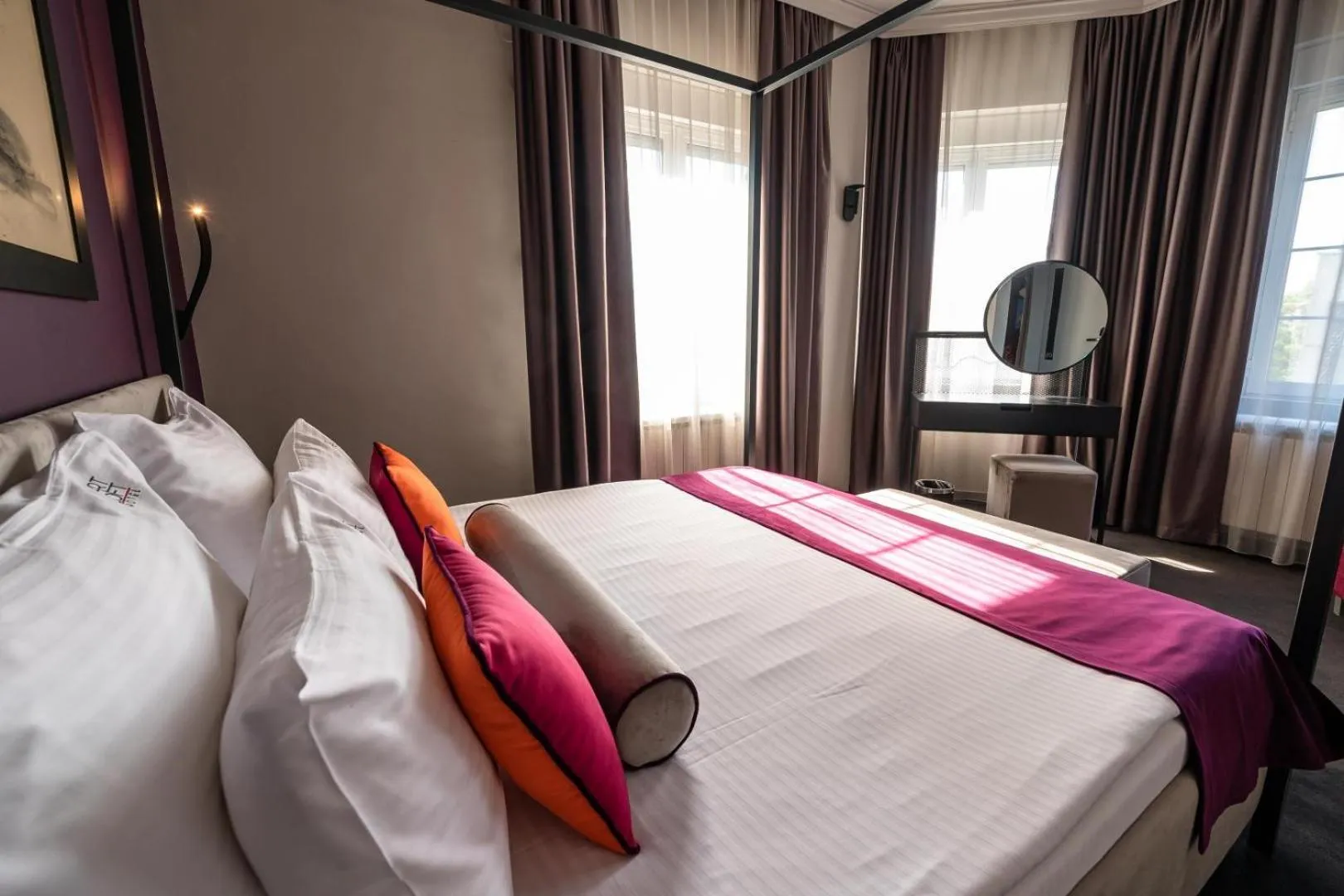 Bed in ArtLoft Garni Hotel