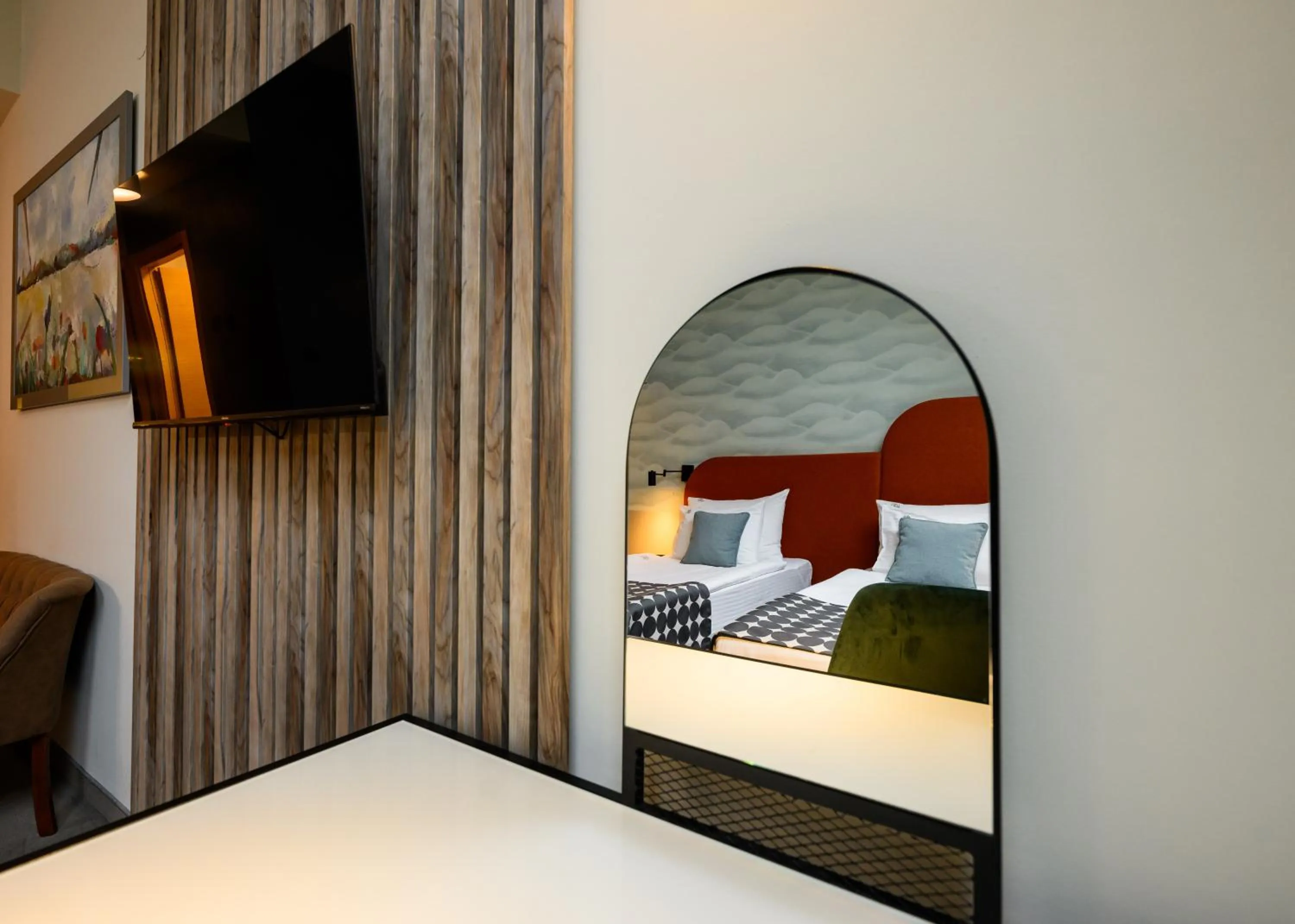 Bed in ArtLoft Garni Hotel