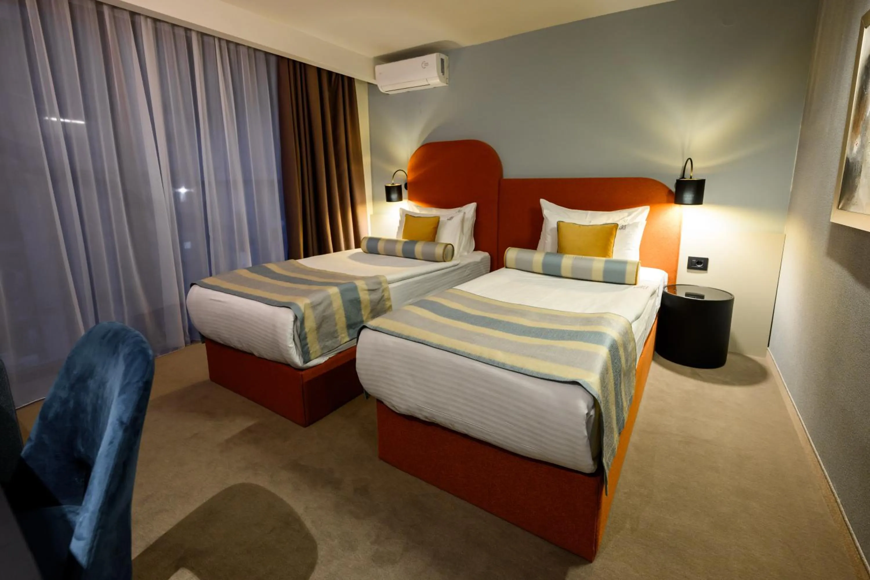 Bed in ArtLoft Garni Hotel