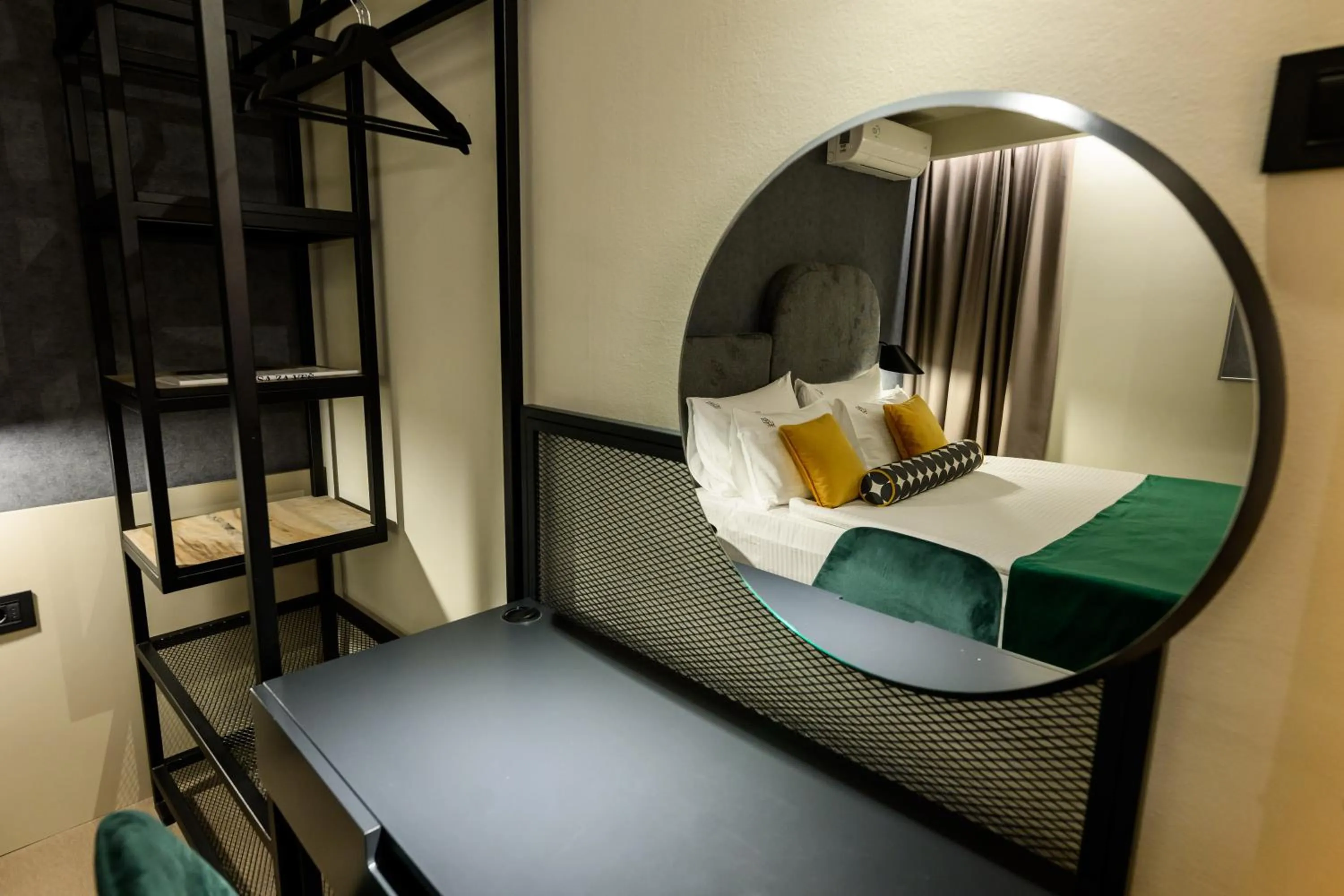 Bed in ArtLoft Garni Hotel