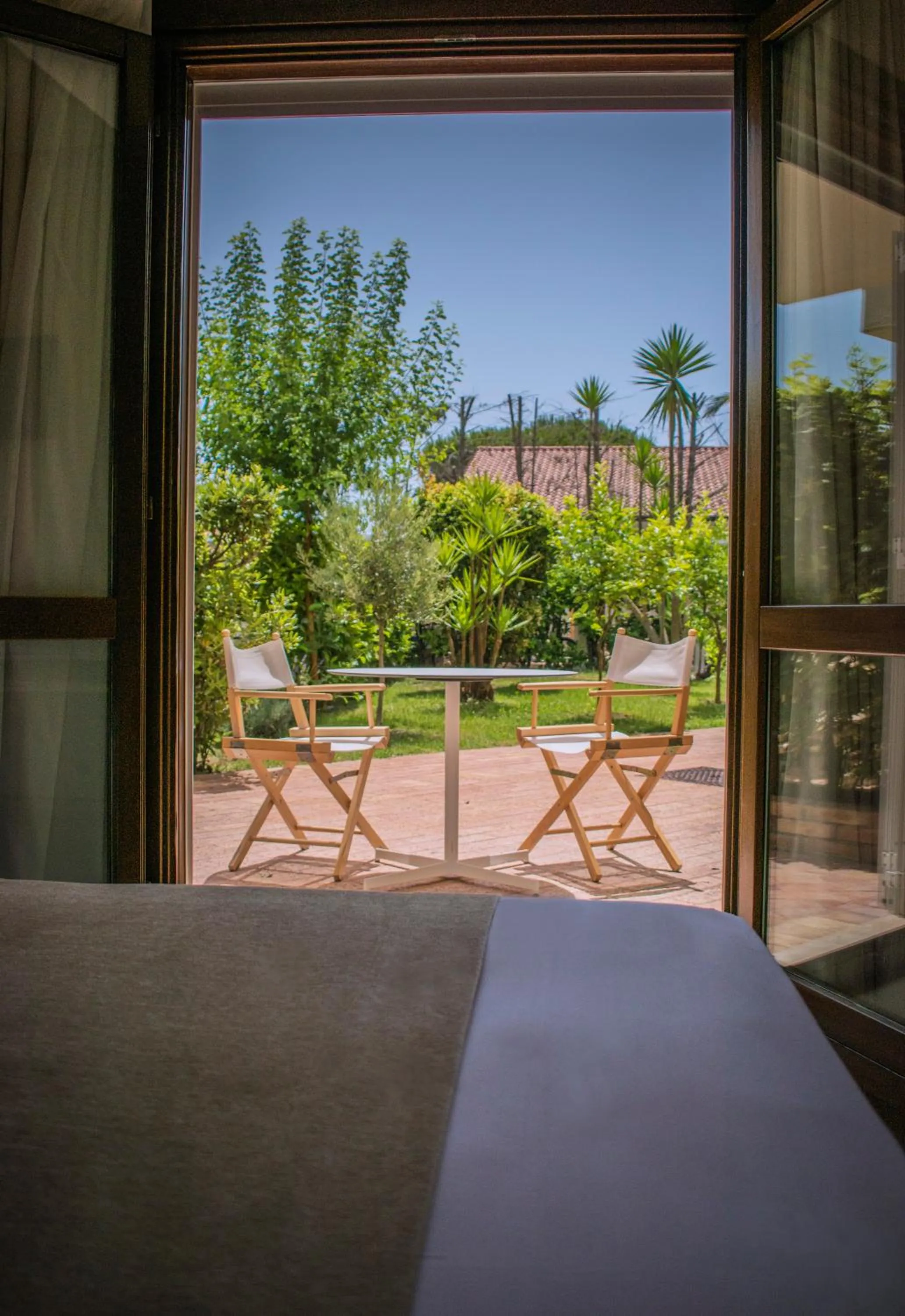 Patio, Bed in Donnarumma Hotel