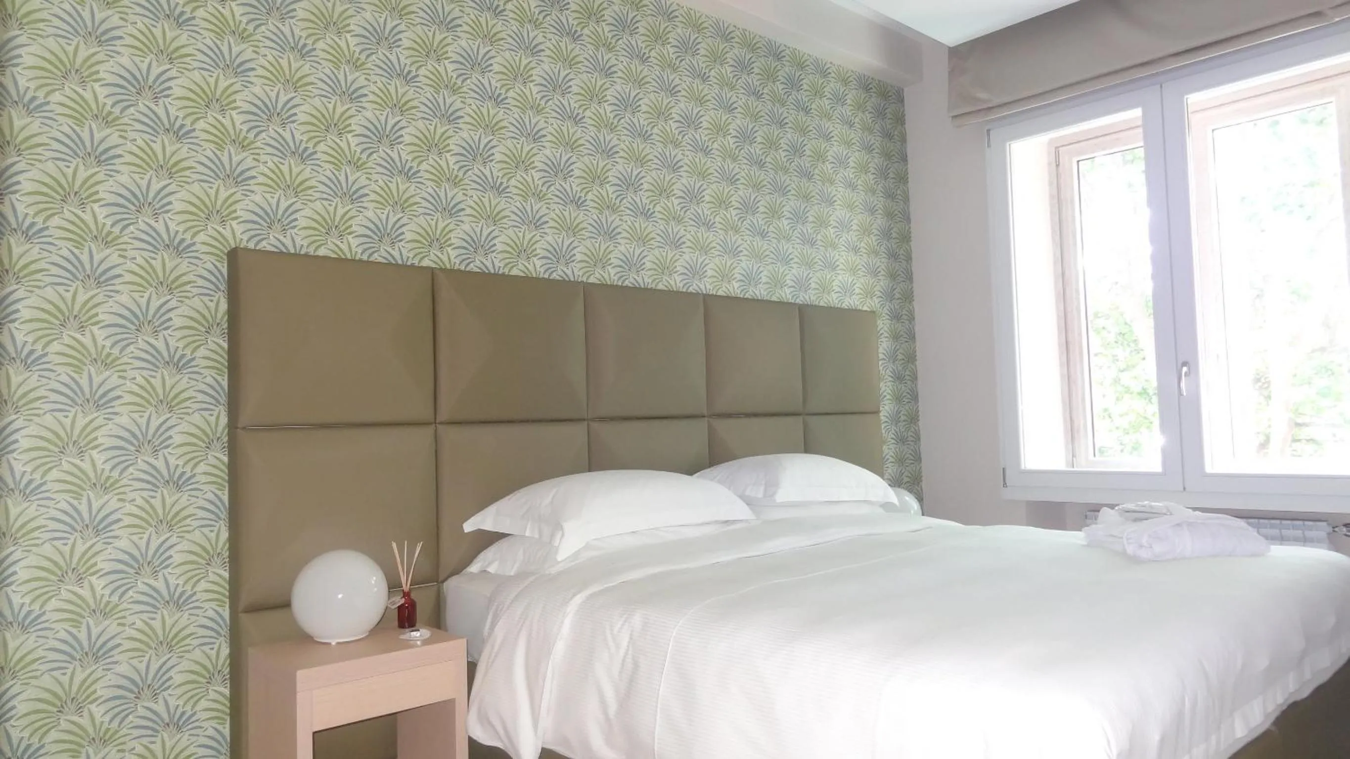 Bedroom, Bed in Augustana House and Suites