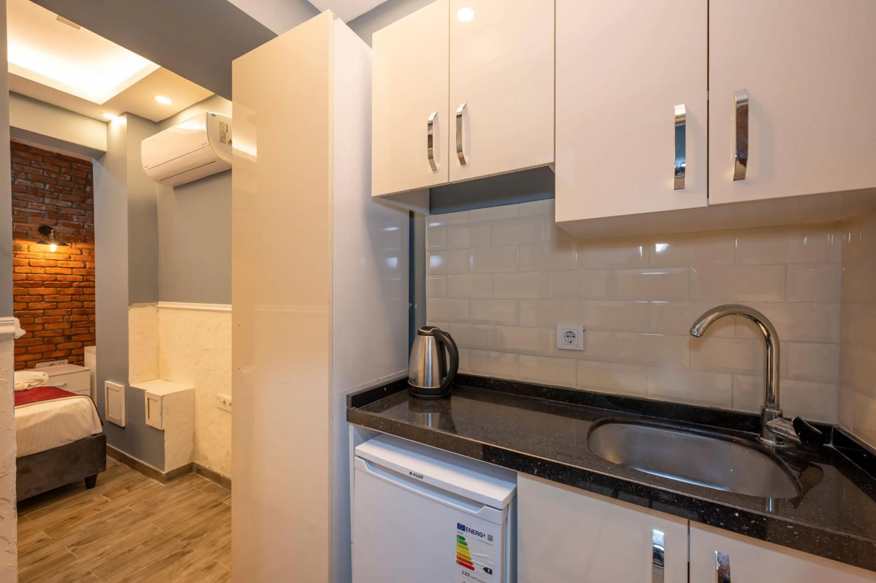 Kitchen or kitchenette, Bed in Taksim Story Residence