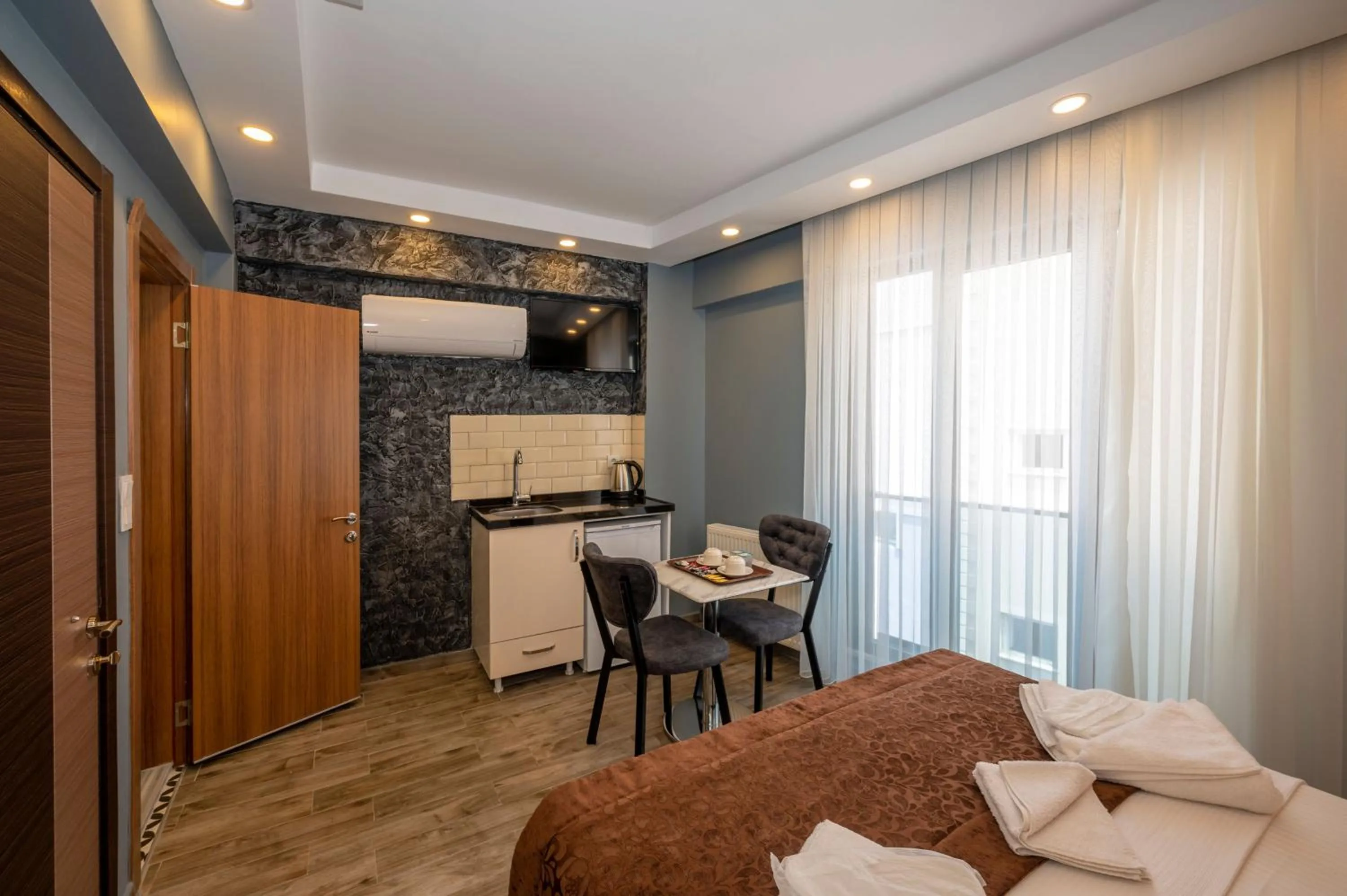 Seating area, Bed in Taksim Story Residence