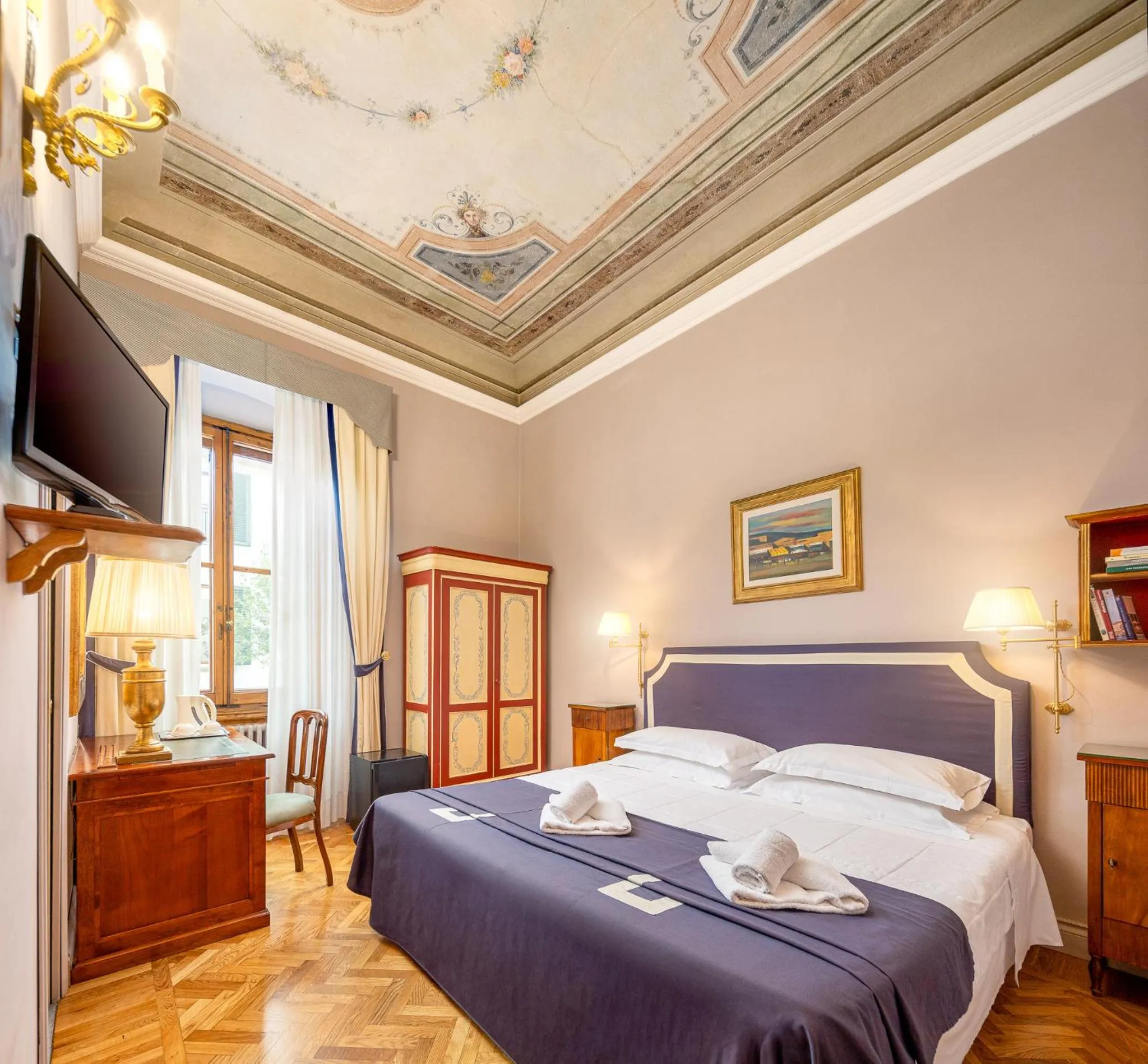 Bed in Il Marzocco Boutique B&B