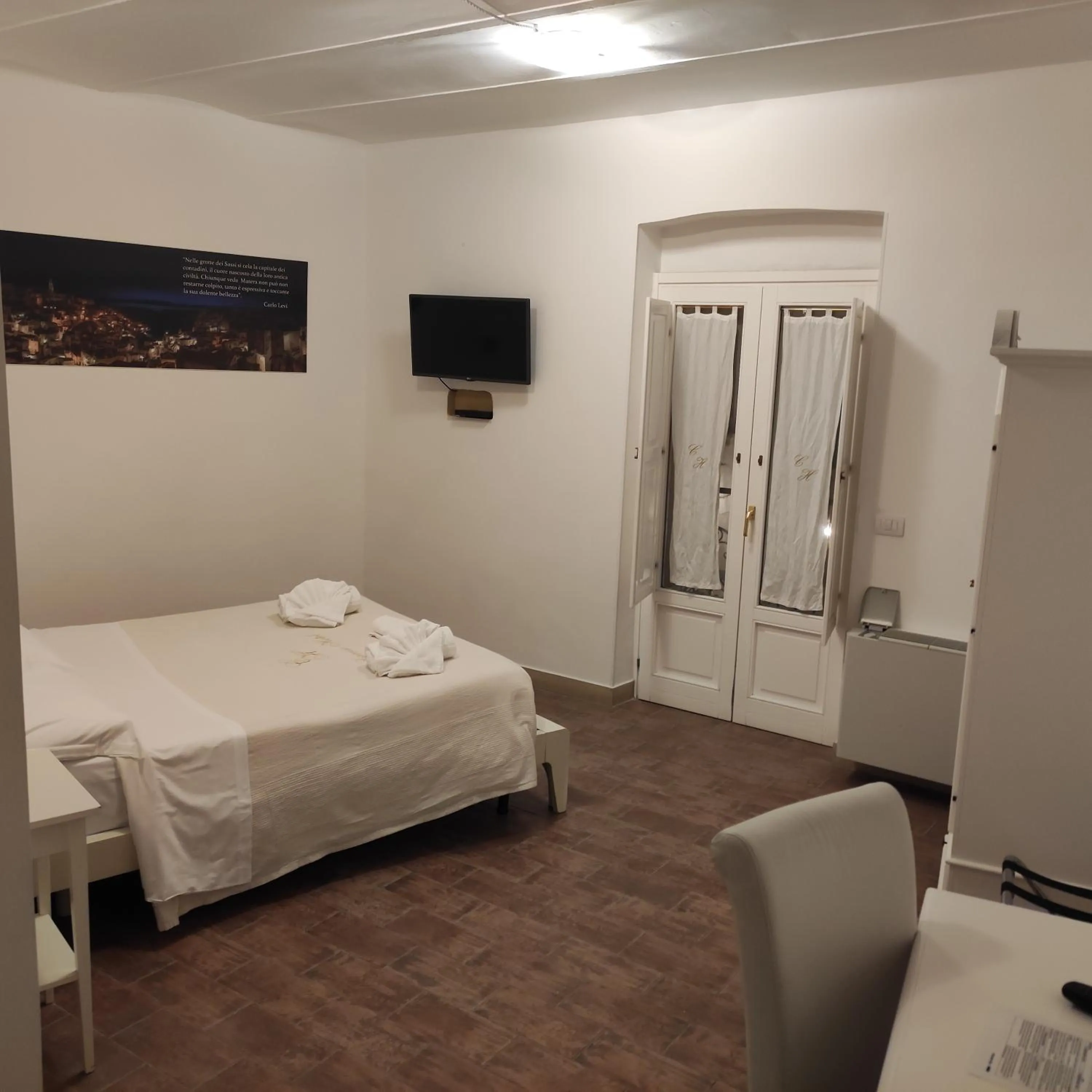 Bedroom, Bed in Caveoso Hotel