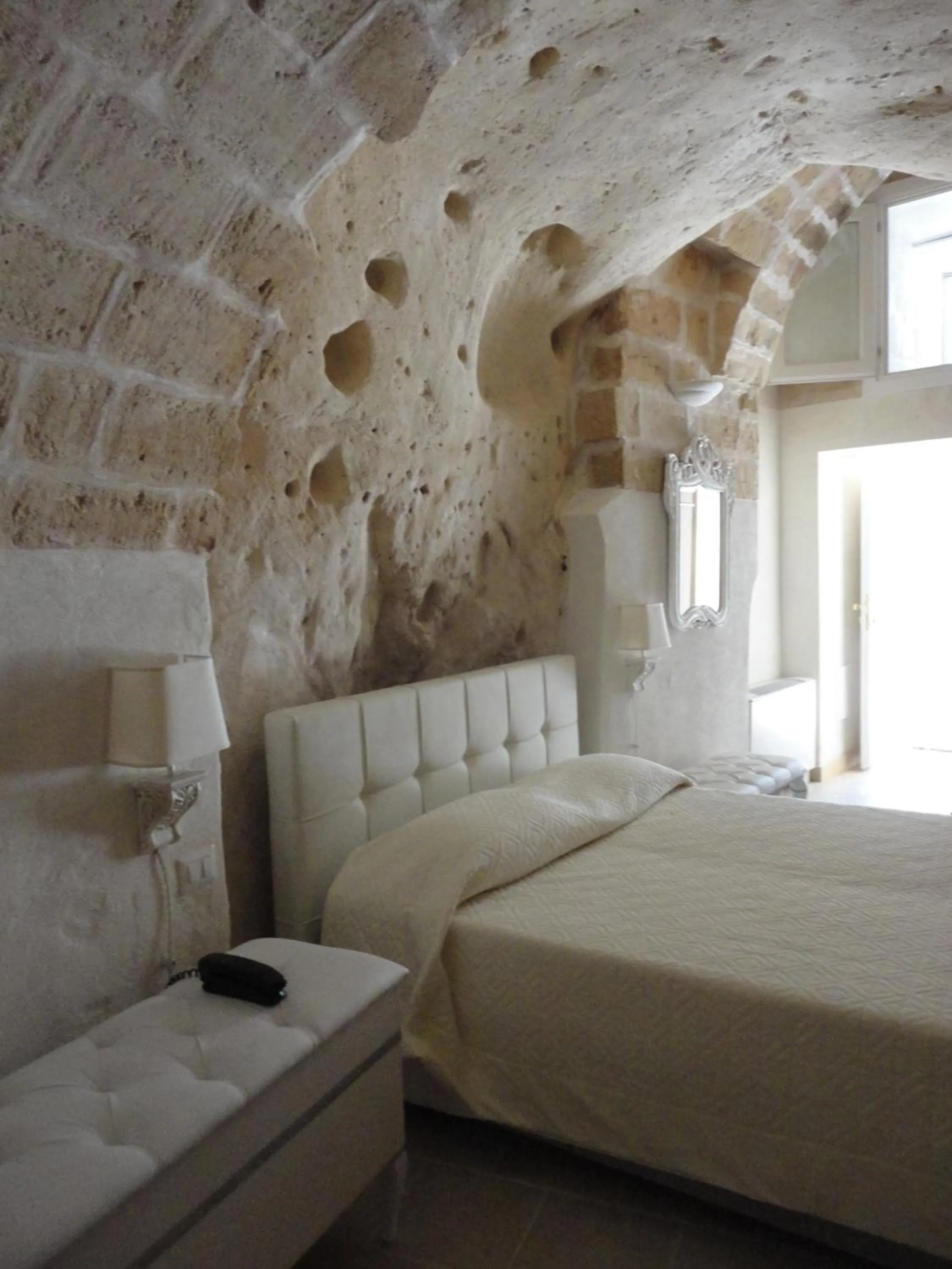 Bed in Caveoso Hotel