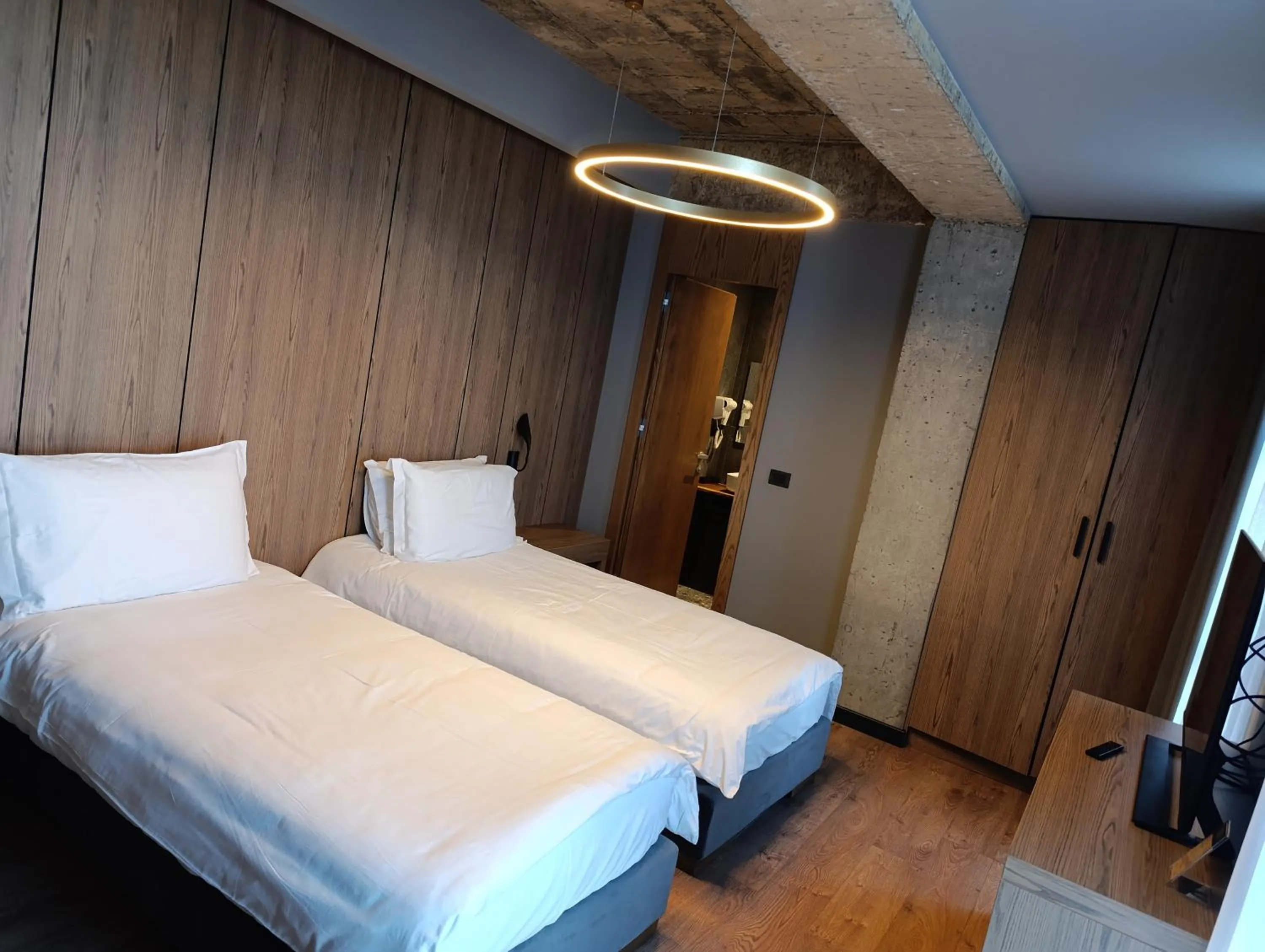 Bed in Toka Hotel Restaurant