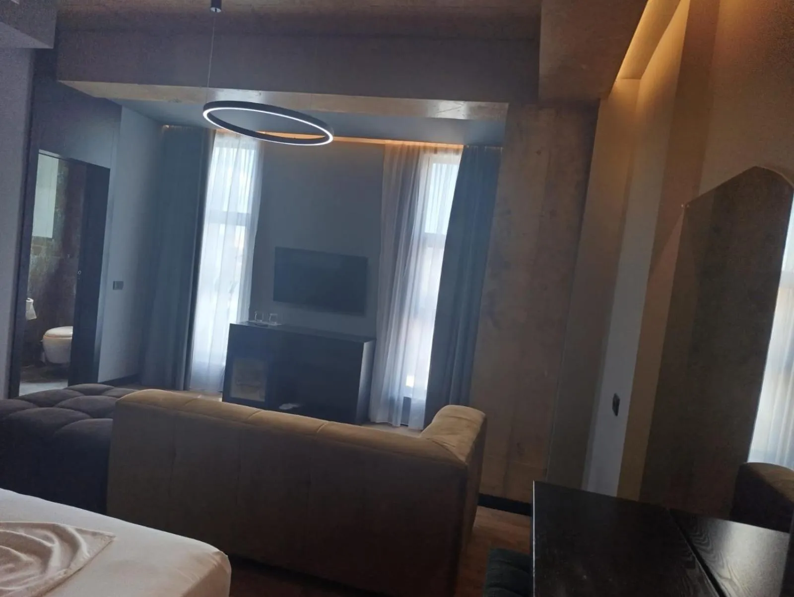 Seating area, Bed in Toka Hotel Restaurant