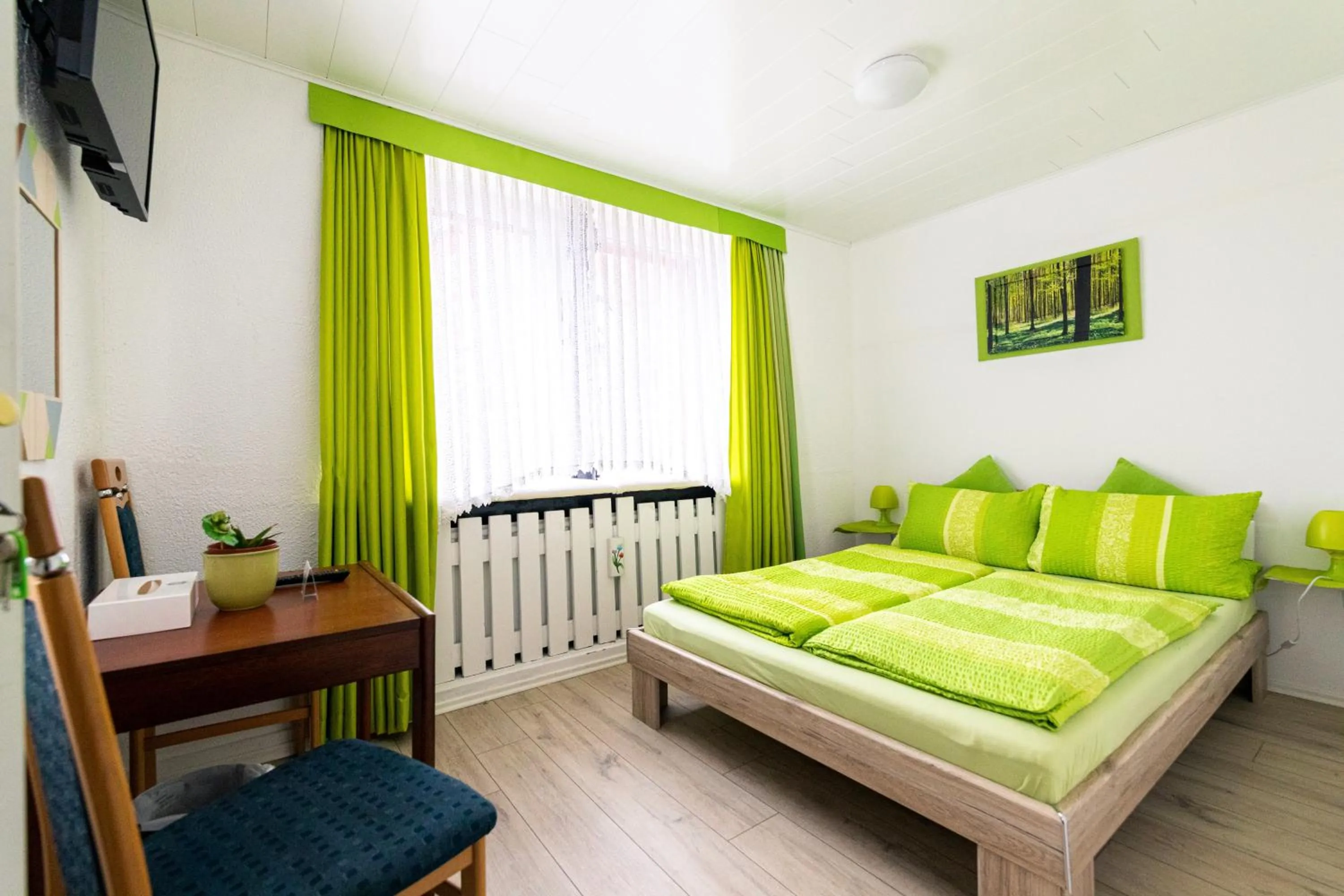 Photo of the whole room, Bed in Gasthaus Tannenhof