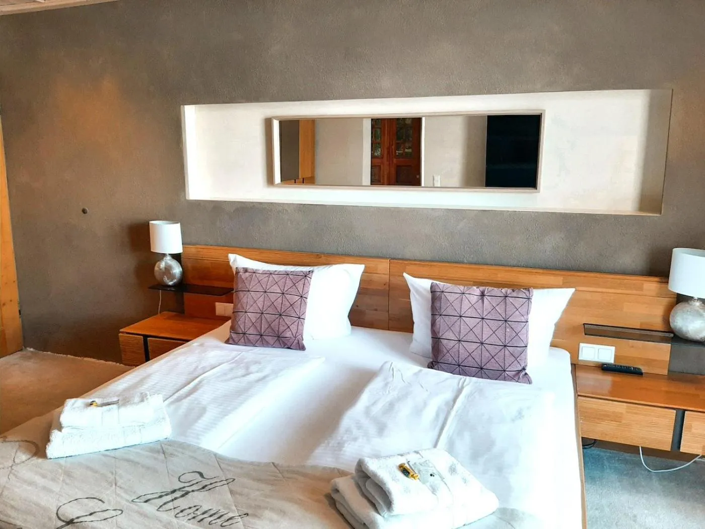 Bed in Das Maximilian - Feines Landhotel am Schliersee