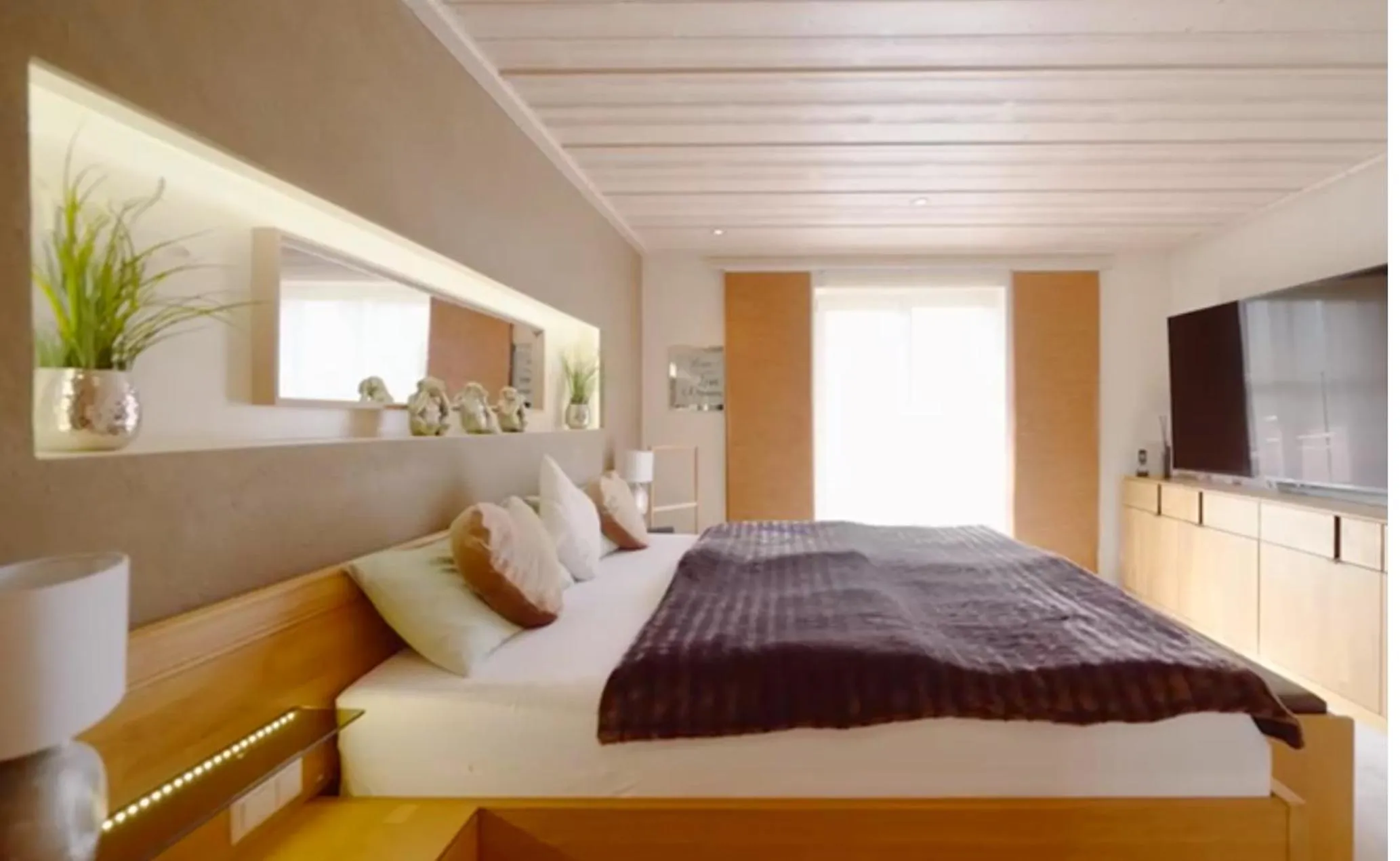 Bed in Das Maximilian - Feines Landhotel am Schliersee