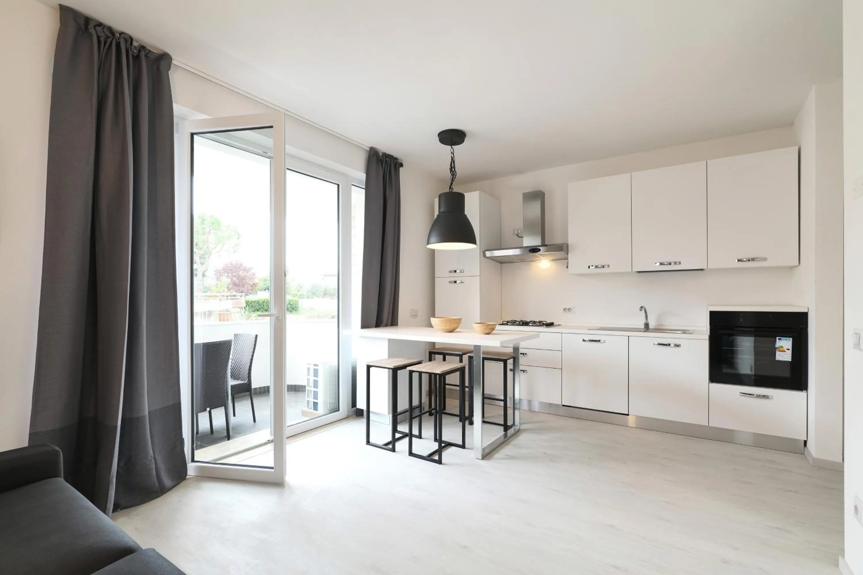 Kitchen or kitchenette in Borgo degli Ulivi Residence di Olympic Garda Lake