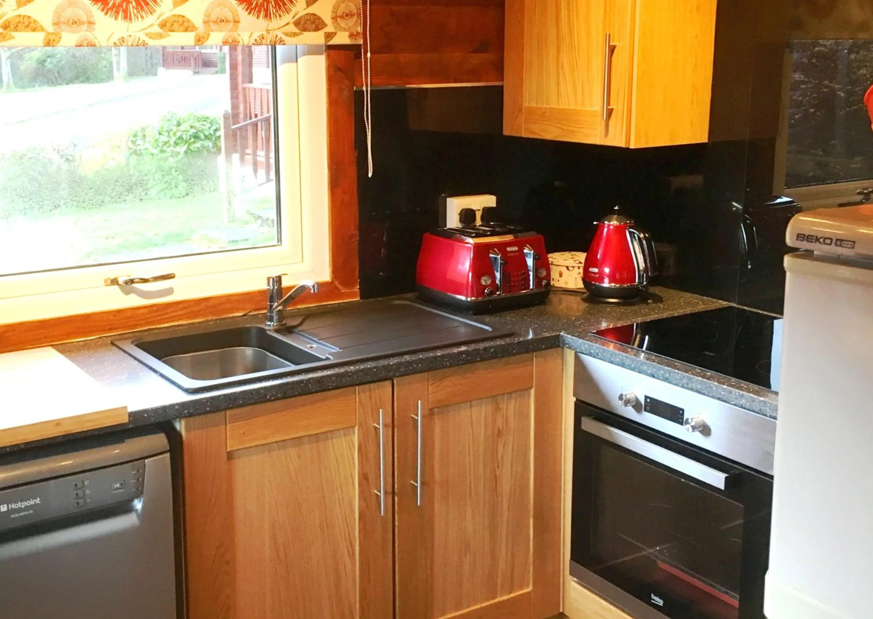 Kitchen or kitchenette in Pucks Glen Lodges, Rashfield, by Dunoon