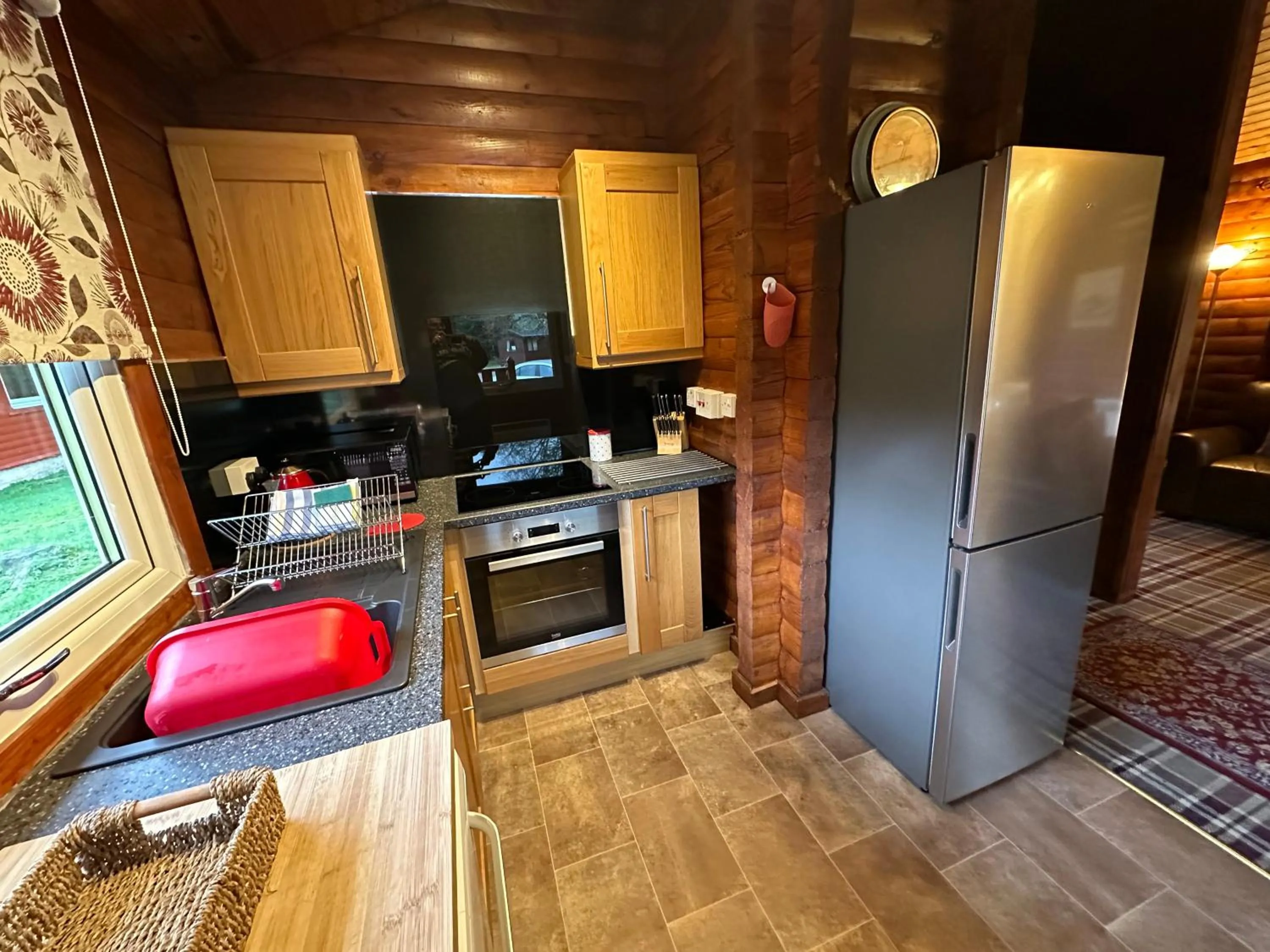 Kitchen or kitchenette in Pucks Glen Lodges, Rashfield, by Dunoon
