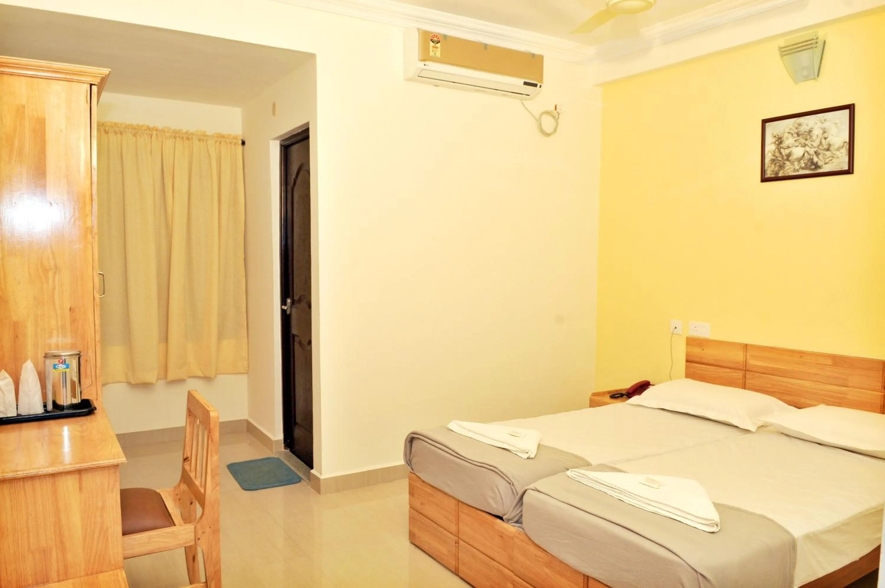 Photo of the whole room, Bed in A V Residency