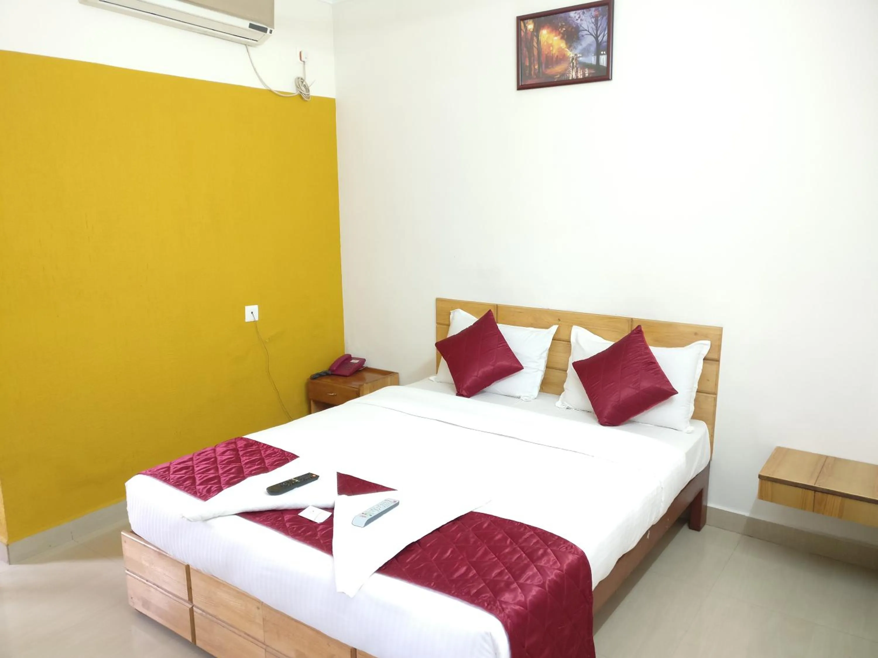 Photo of the whole room, Bed in A V Residency