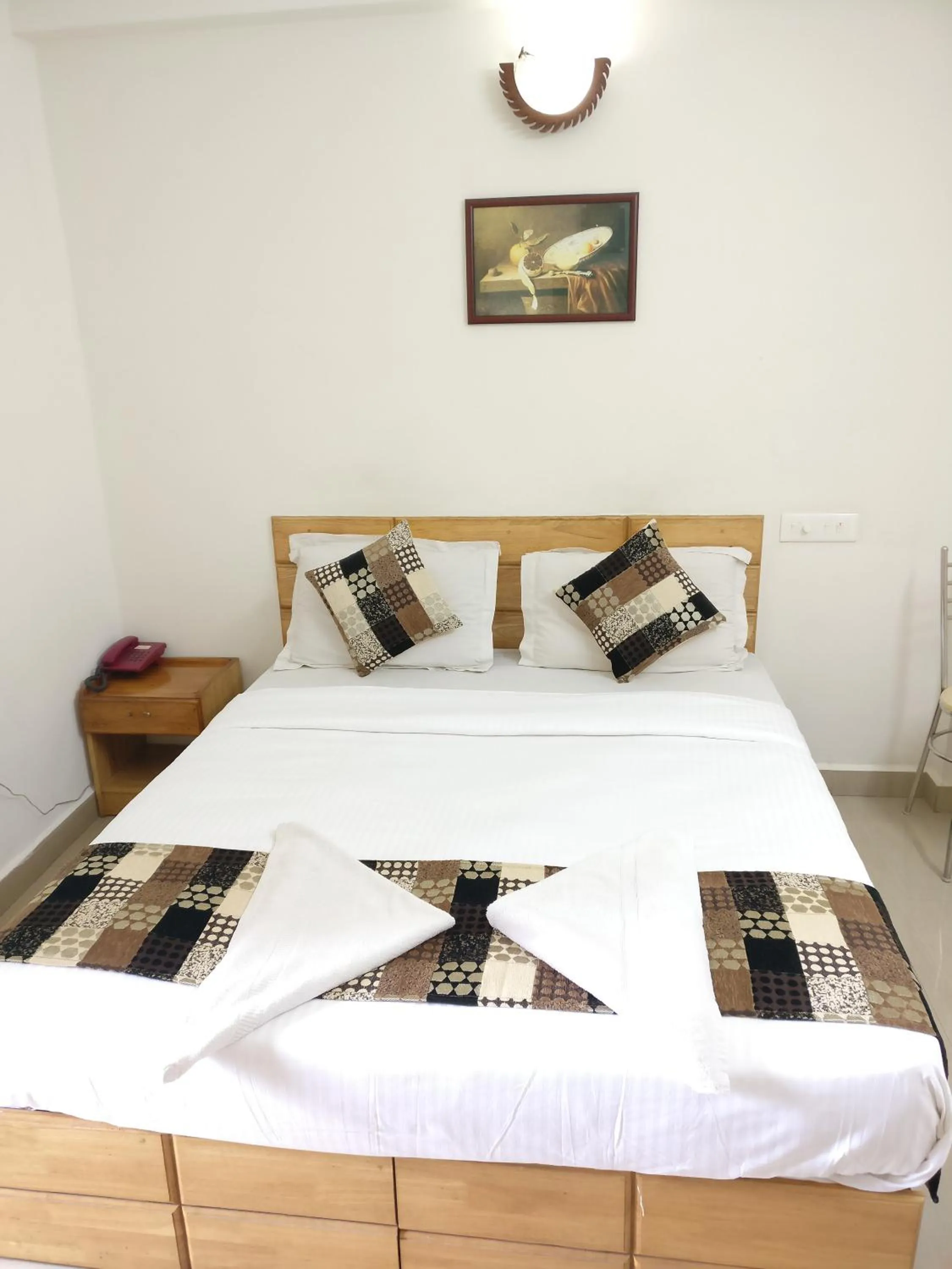 Photo of the whole room, Bed in A V Residency