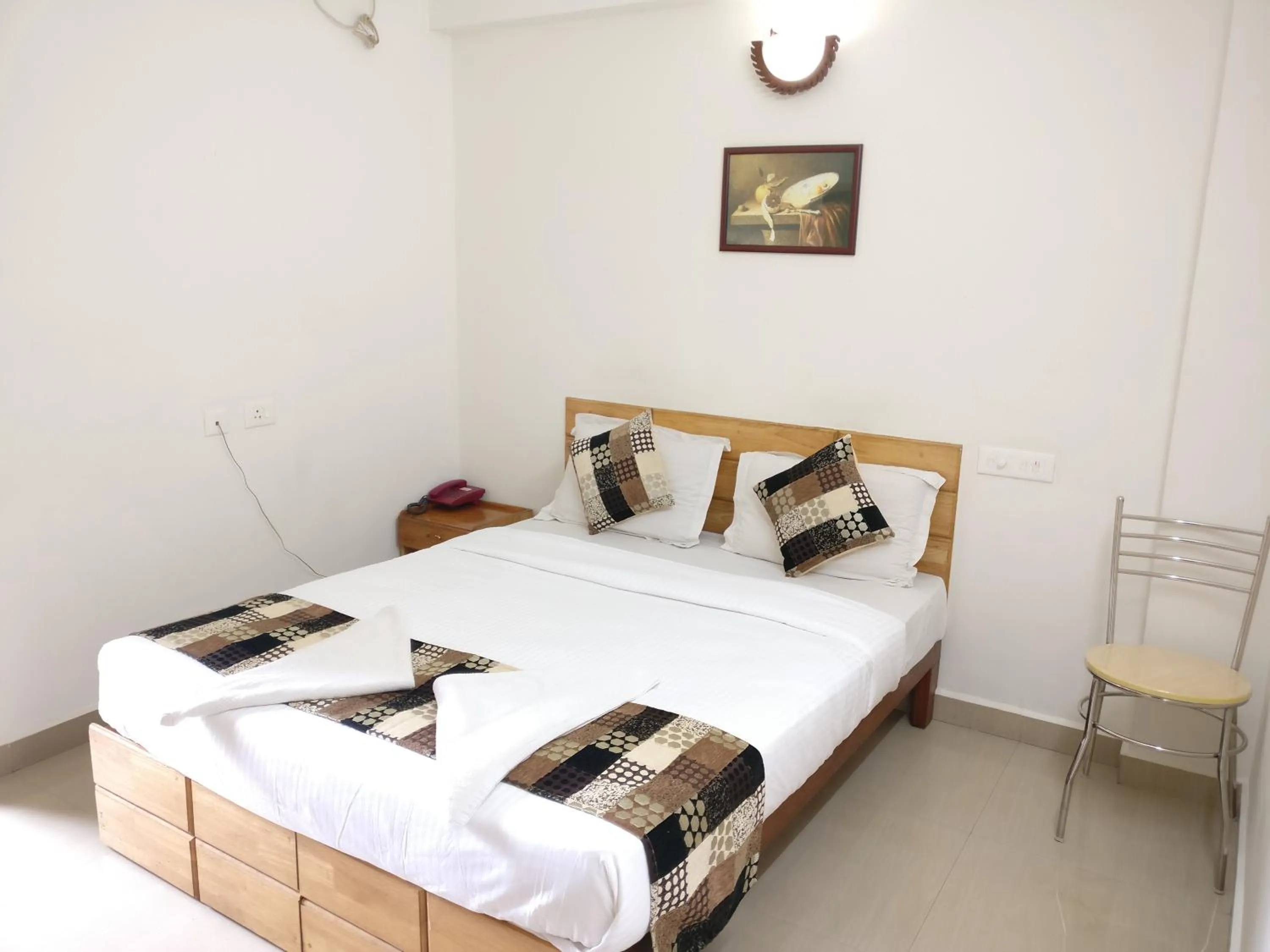 Photo of the whole room, Bed in A V Residency