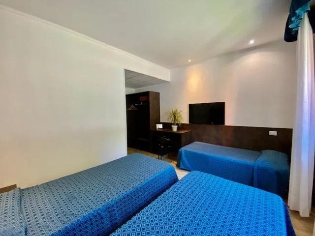 Bed in Hotel Garibaldi