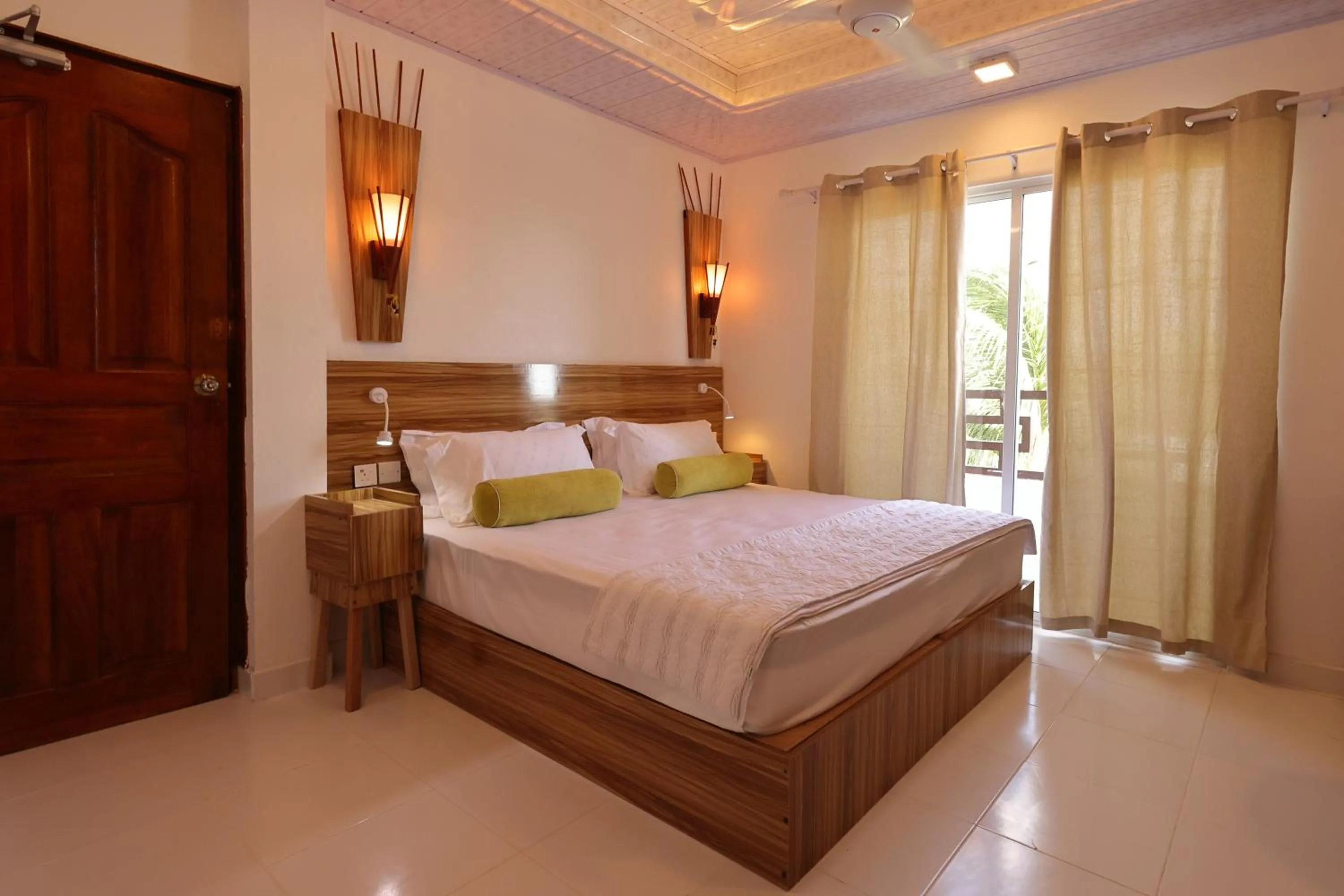 Bed in Batuta Maldives Fourson