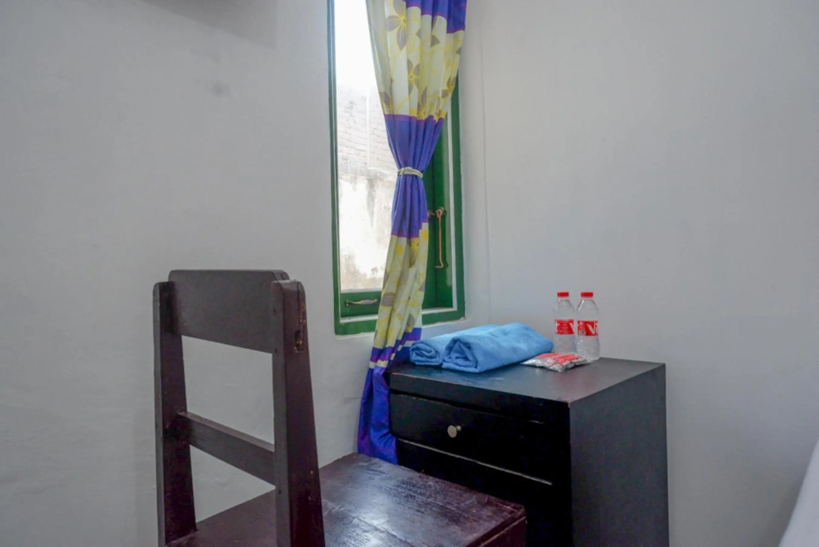 Bed in RedDoorz Syariah @ Ndalem Kembang Sore Yogyakarta