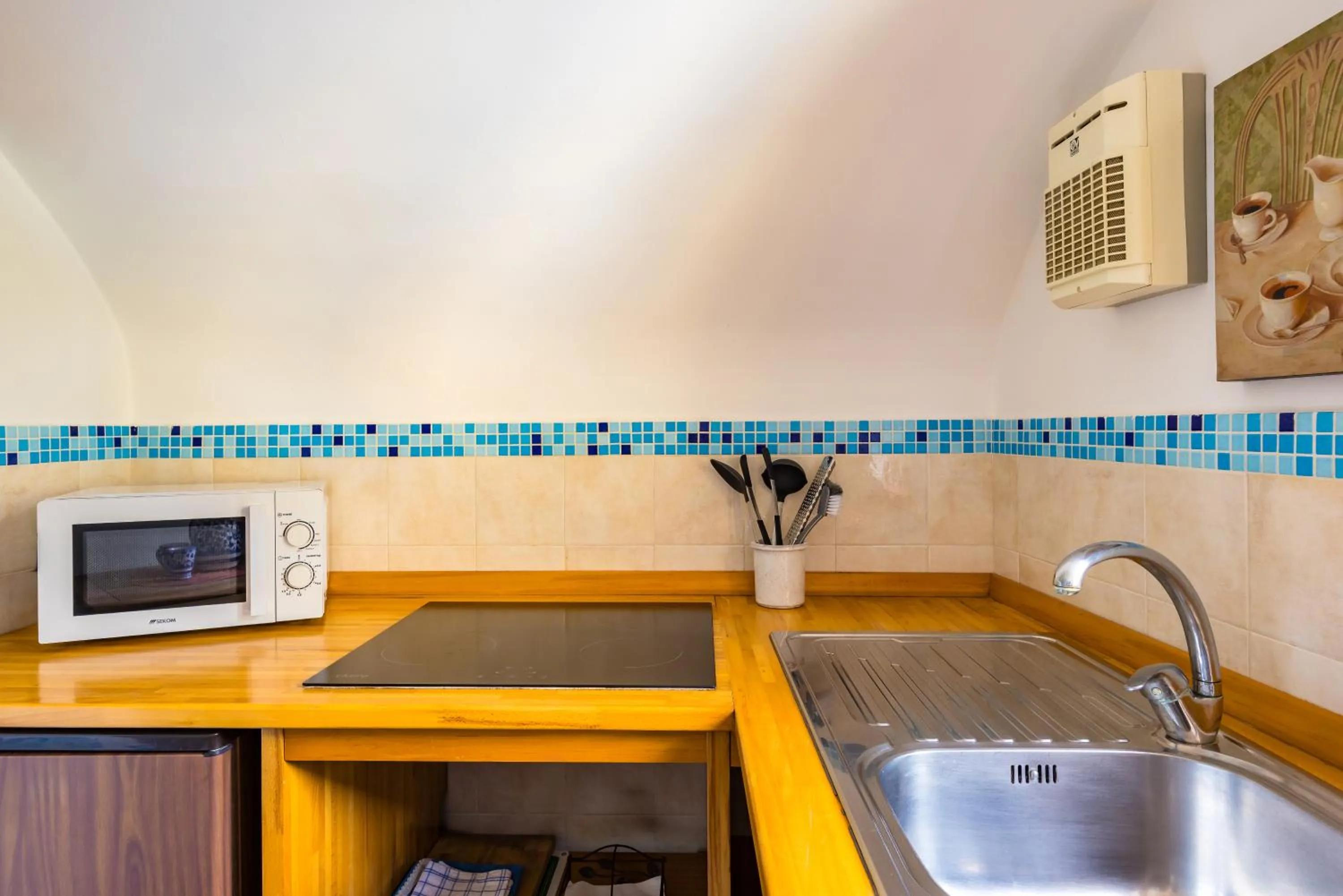 Kitchen or kitchenette in Orchid Corner Guesthouse