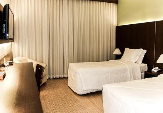 Bed in Hotel Mirante São Brás