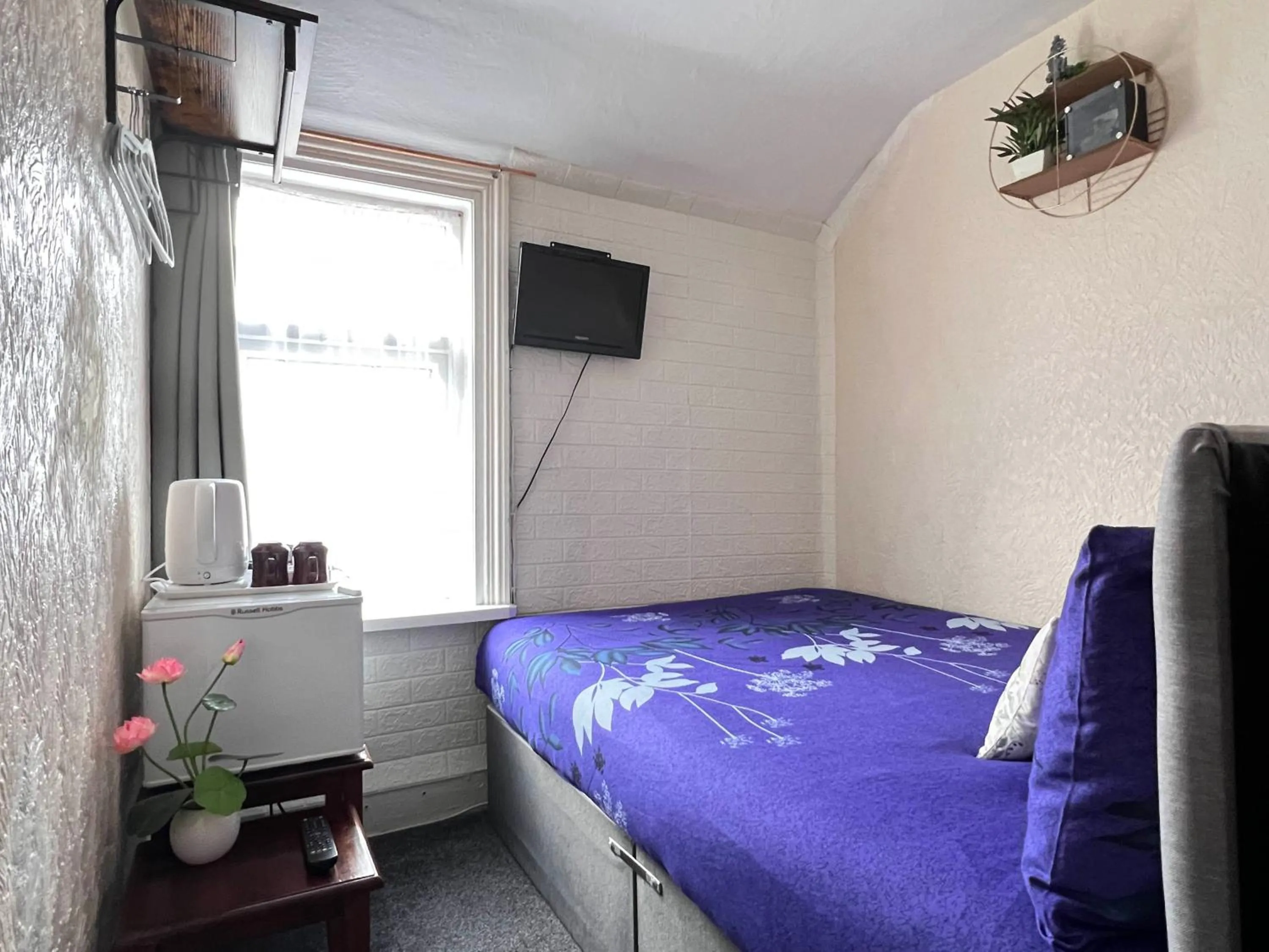 Photo of the whole room, Bed in Galaxy Hotel