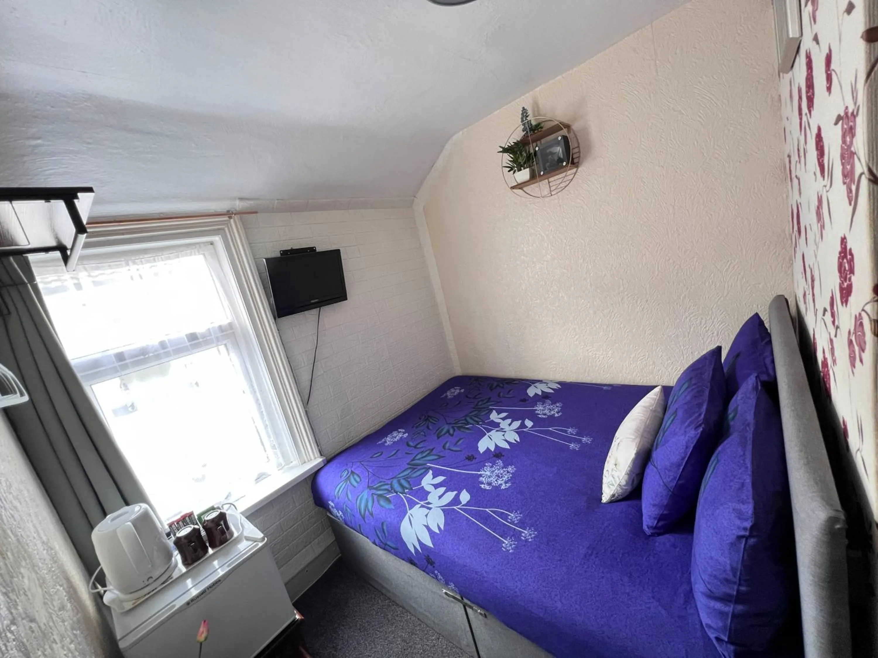 Photo of the whole room, Bed in Galaxy Hotel