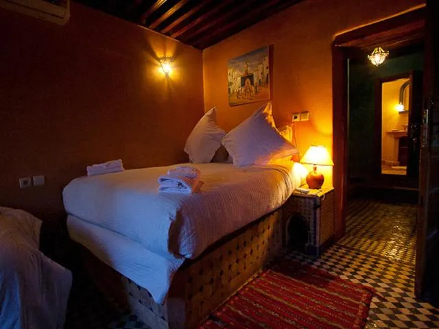 Bed in Riad Layalina Fes