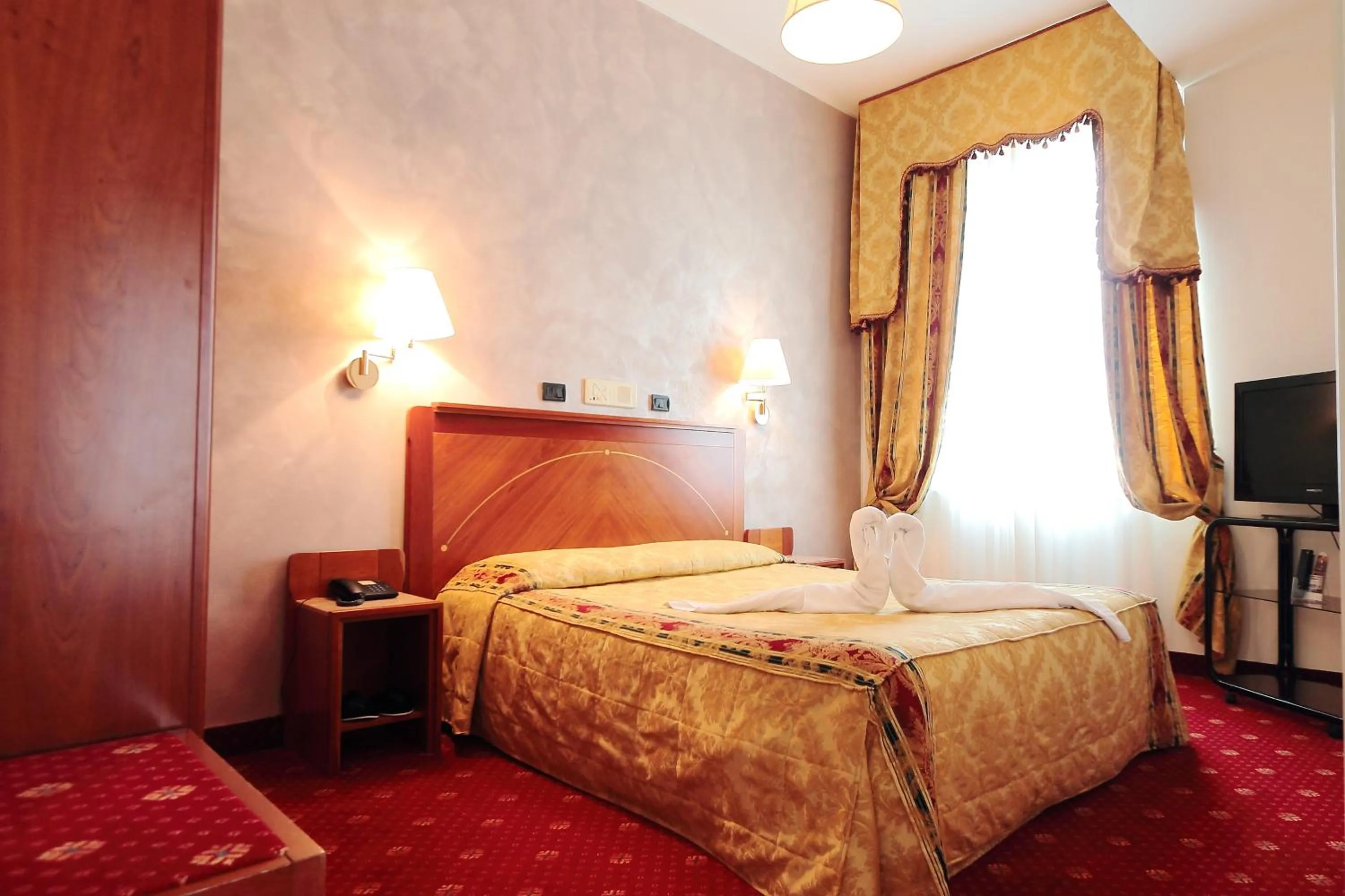 Bed in Rechigi Park Hotel