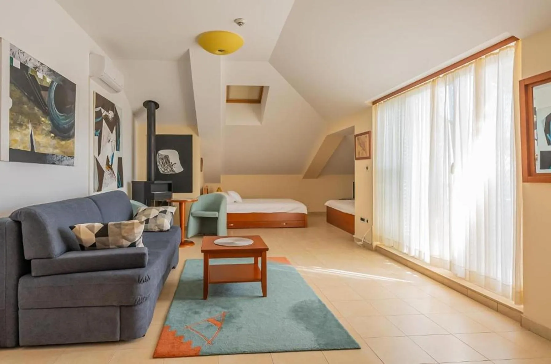 Communal lounge/ TV room in Villa Arcadium