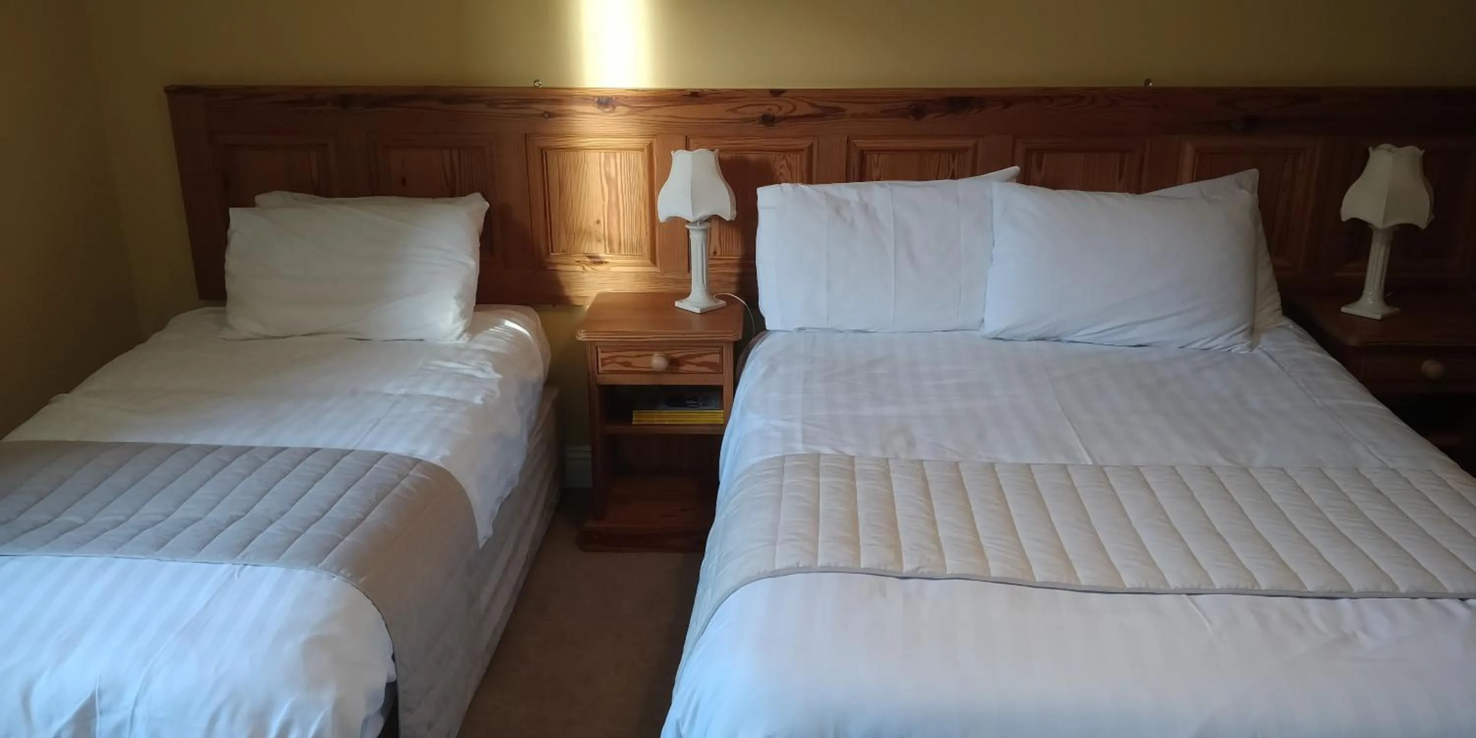 Bed in Avonmore House Guest Accommodation