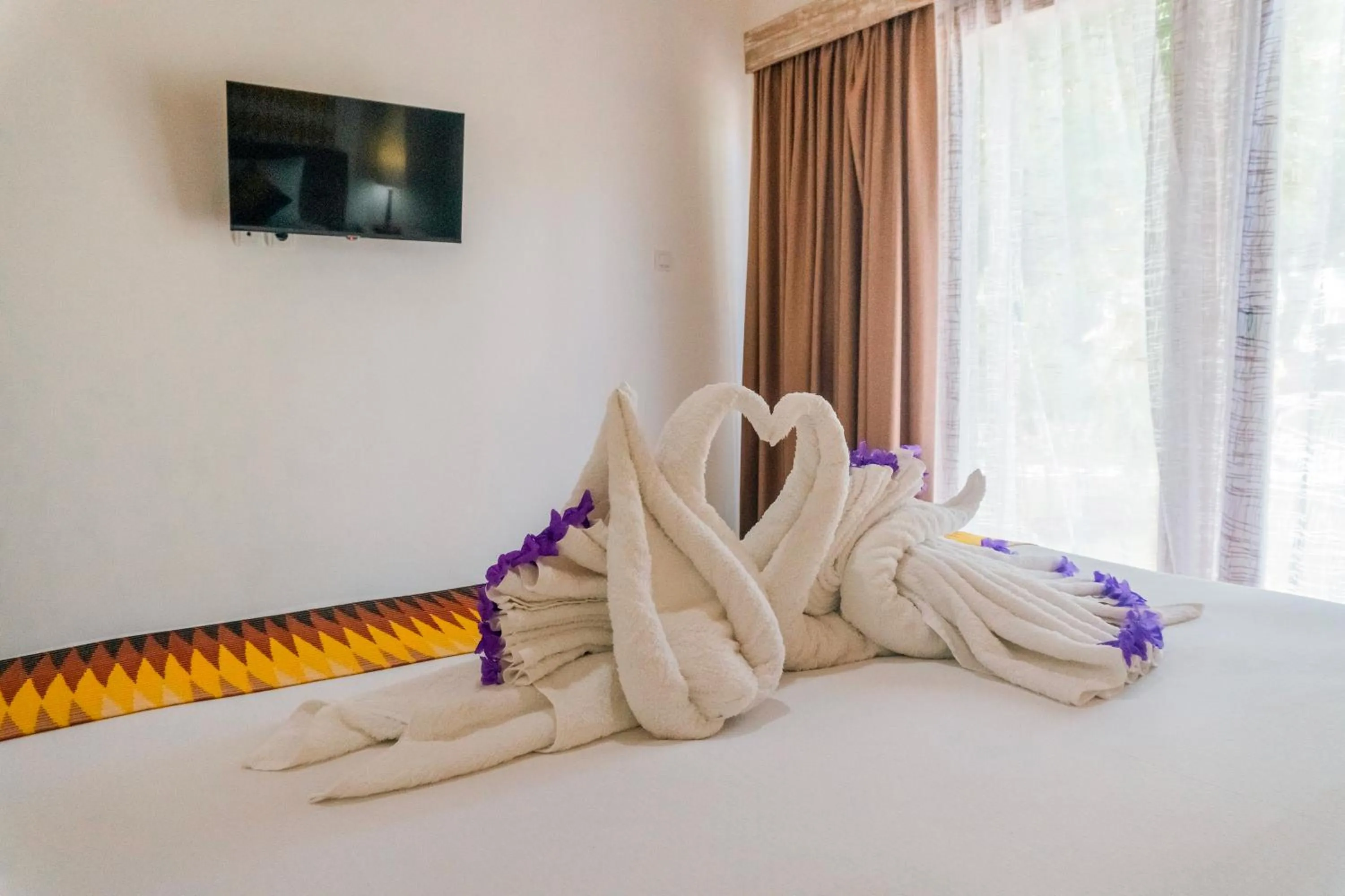 Bed in Caspla Resort by Loccal Collection