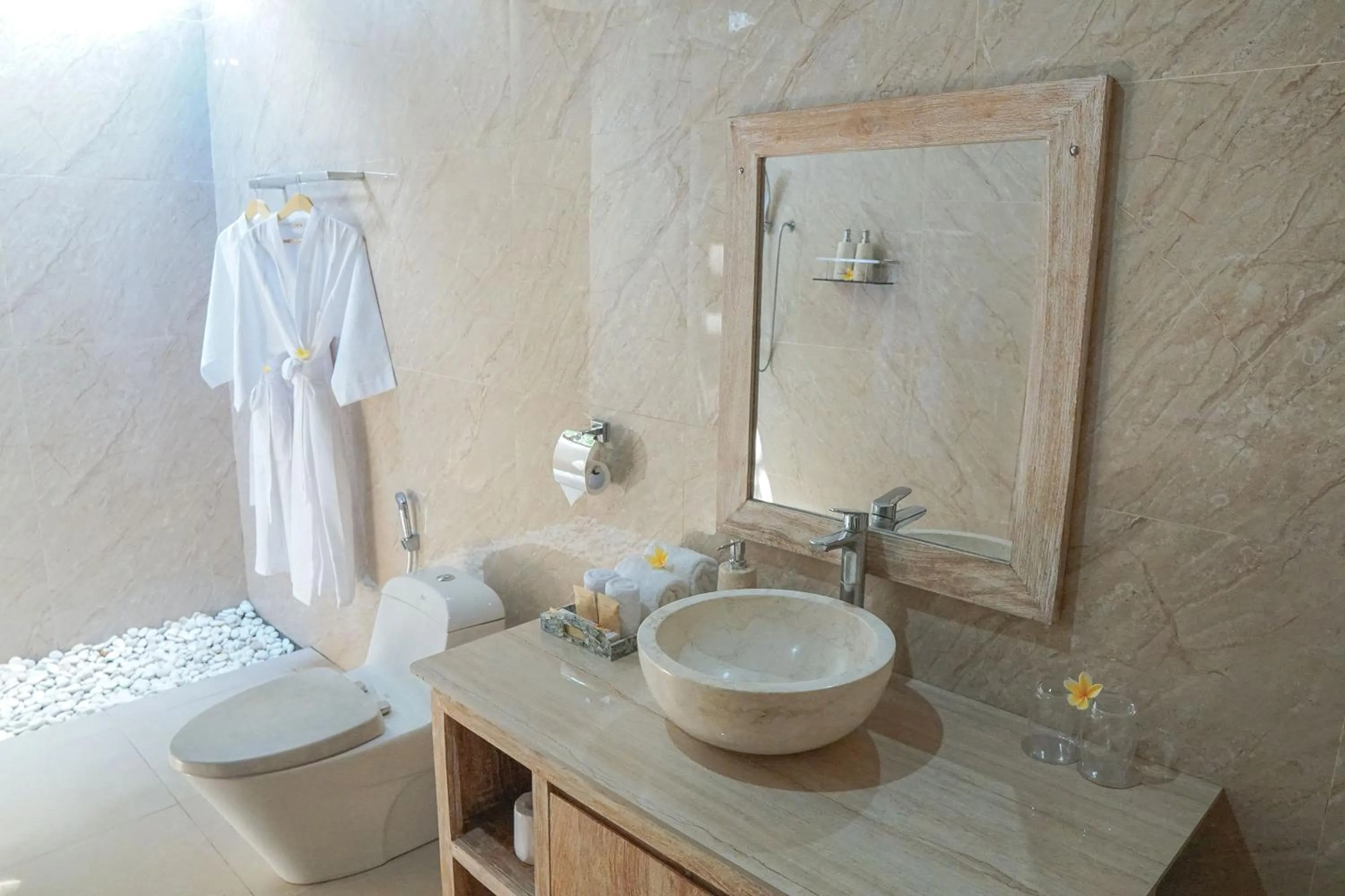 Toilet in Caspla Resort by Loccal Collection