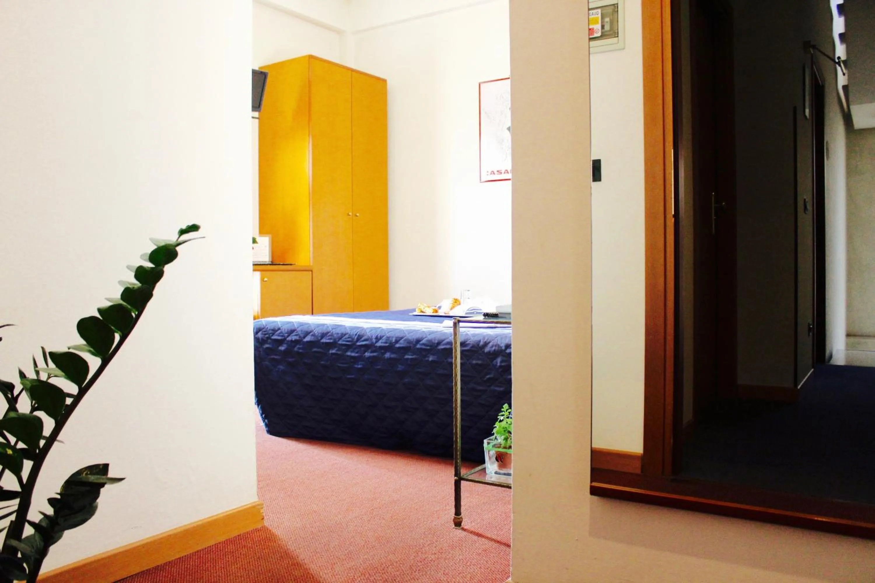 Bed in Arcangelo Roof Hotel