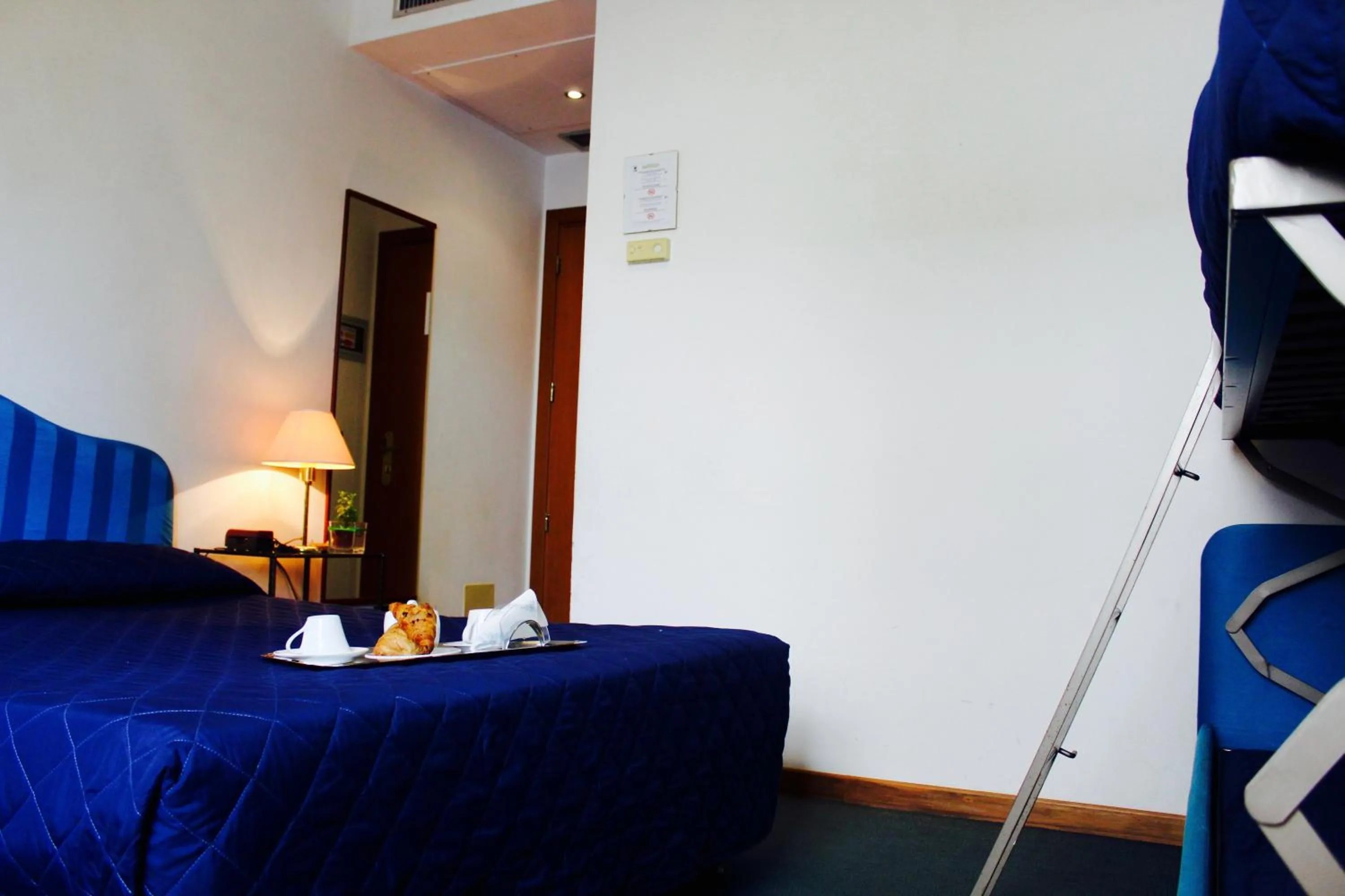 Bed in Arcangelo Roof Hotel