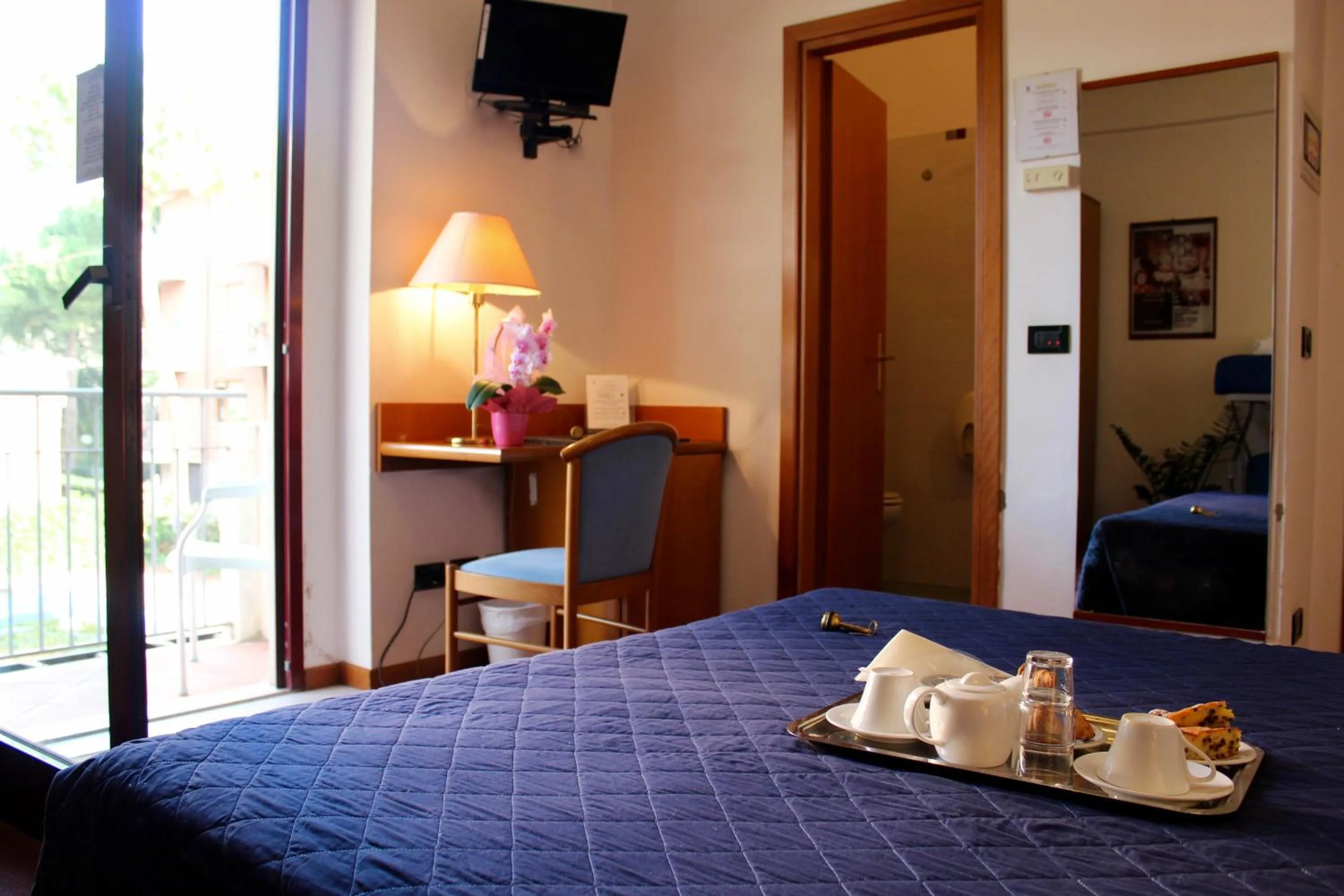 Bed in Arcangelo Roof Hotel