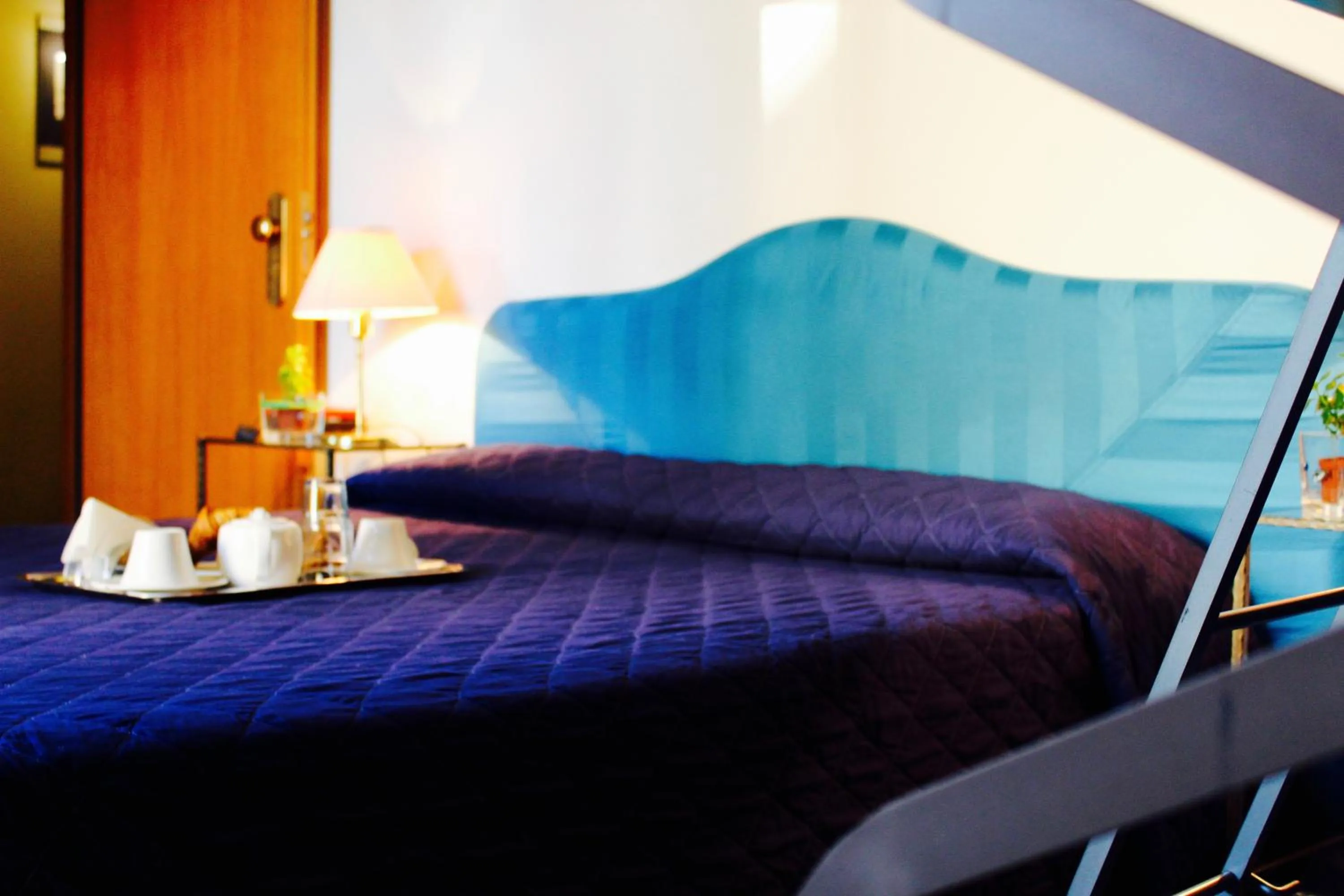 Bed in Arcangelo Roof Hotel