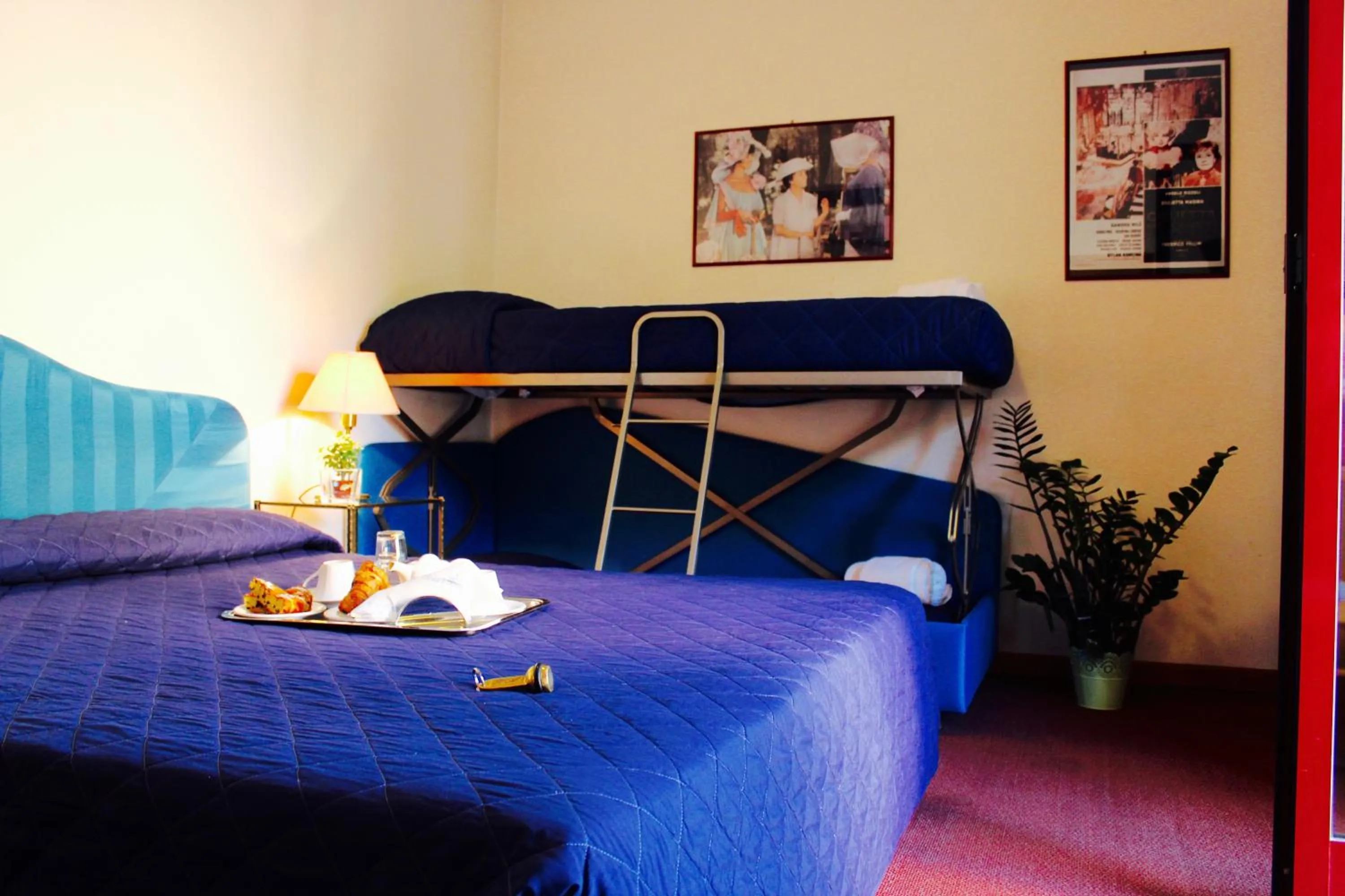 Bed in Arcangelo Roof Hotel