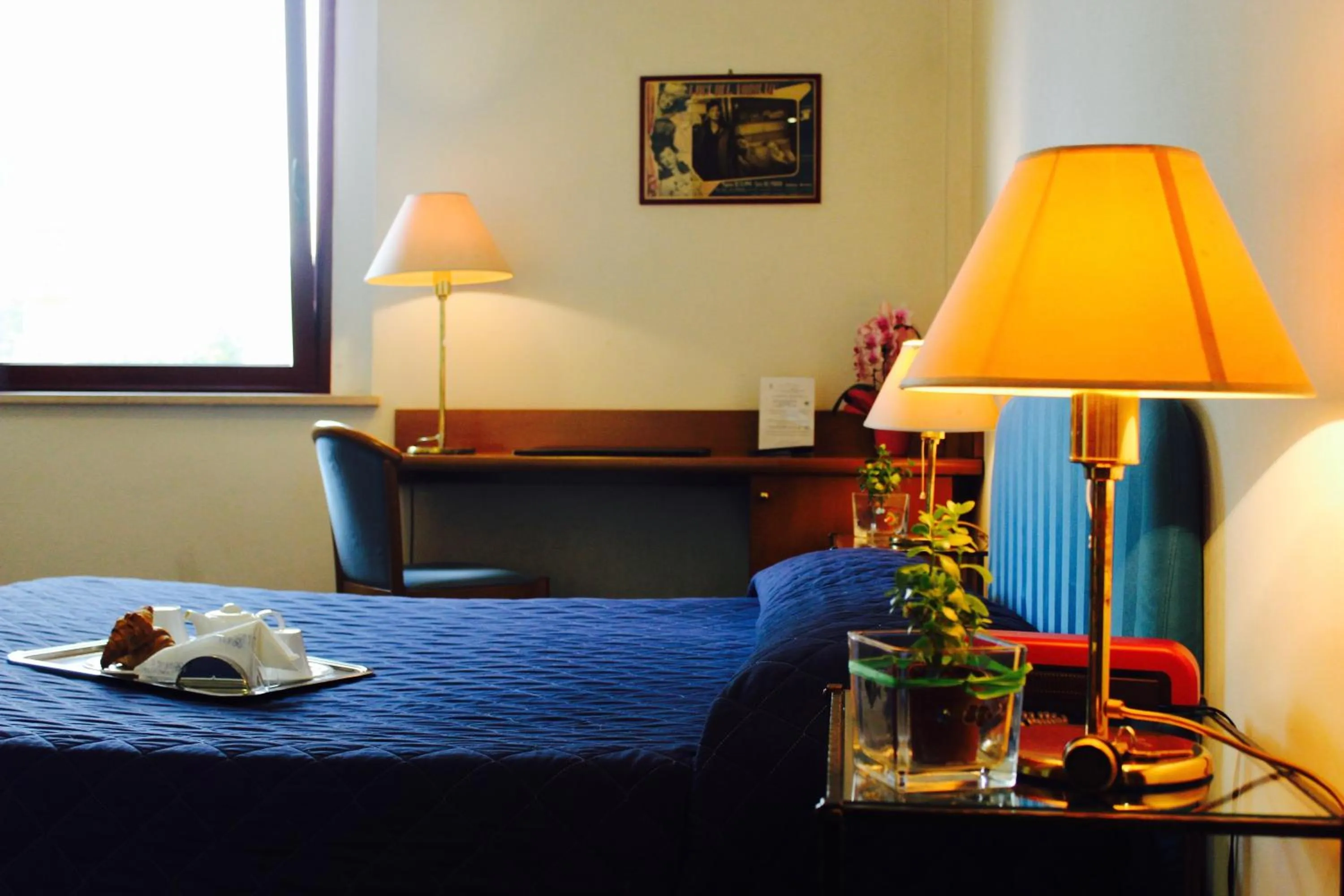 Bed in Arcangelo Roof Hotel