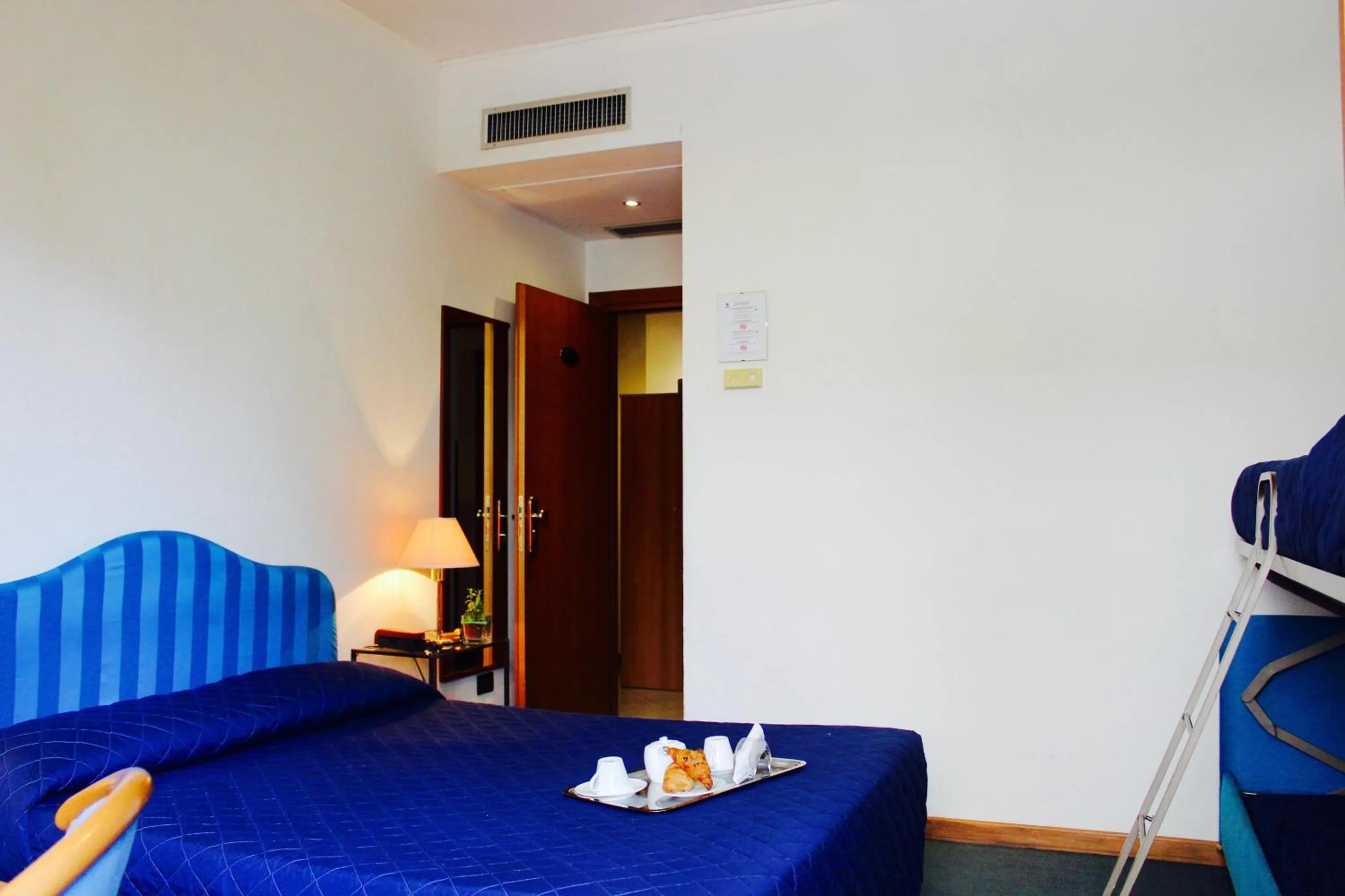 Bed in Arcangelo Roof Hotel