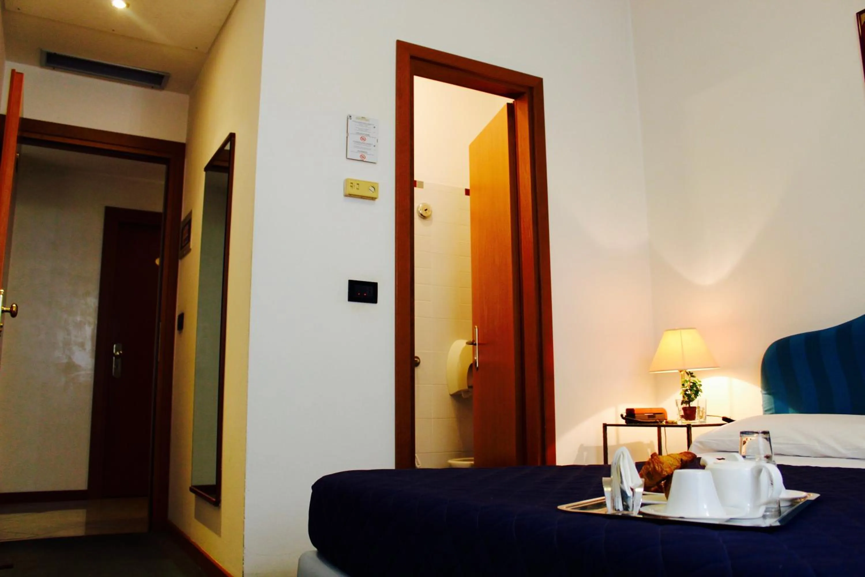 Bed in Arcangelo Roof Hotel