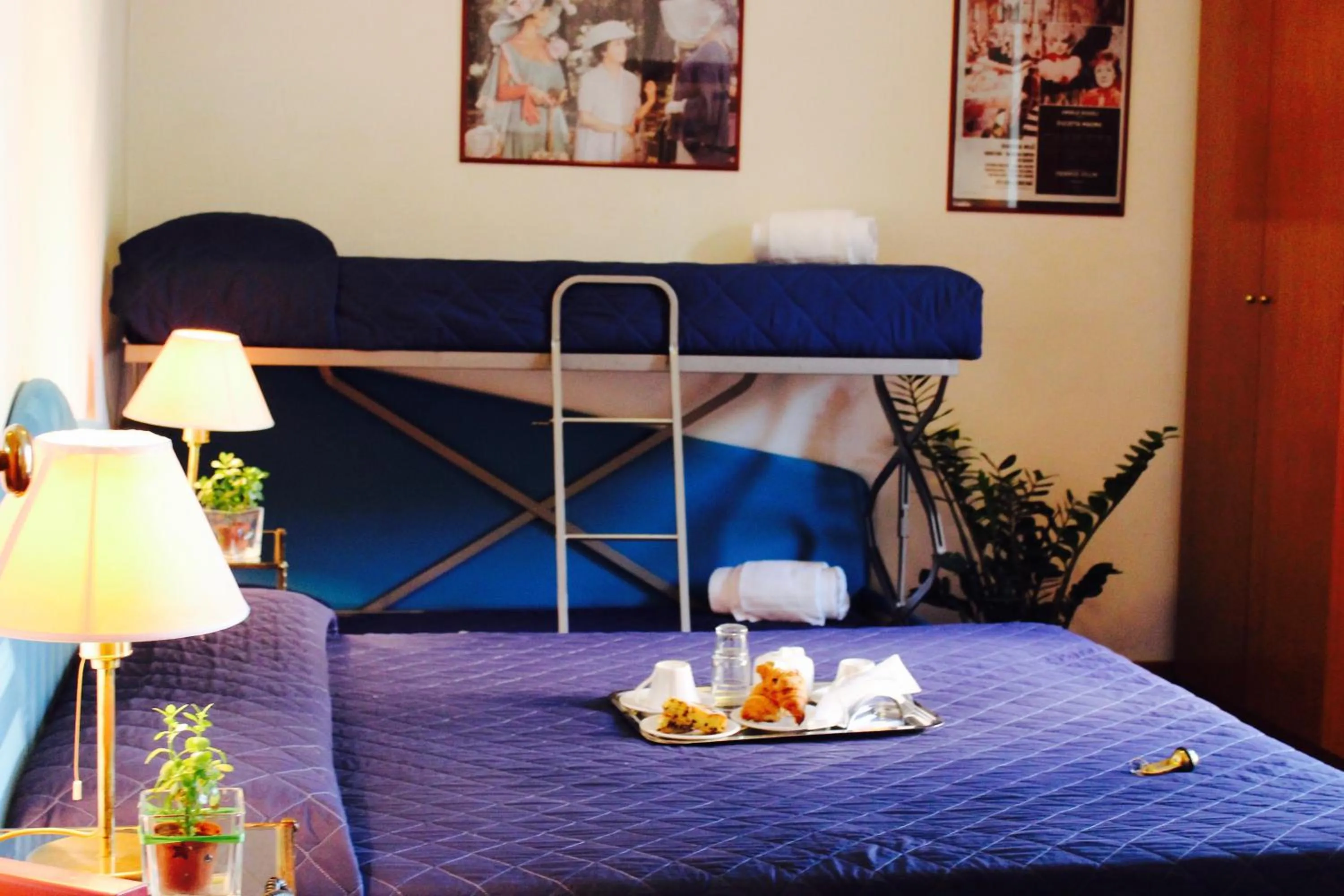 Bed in Arcangelo Roof Hotel