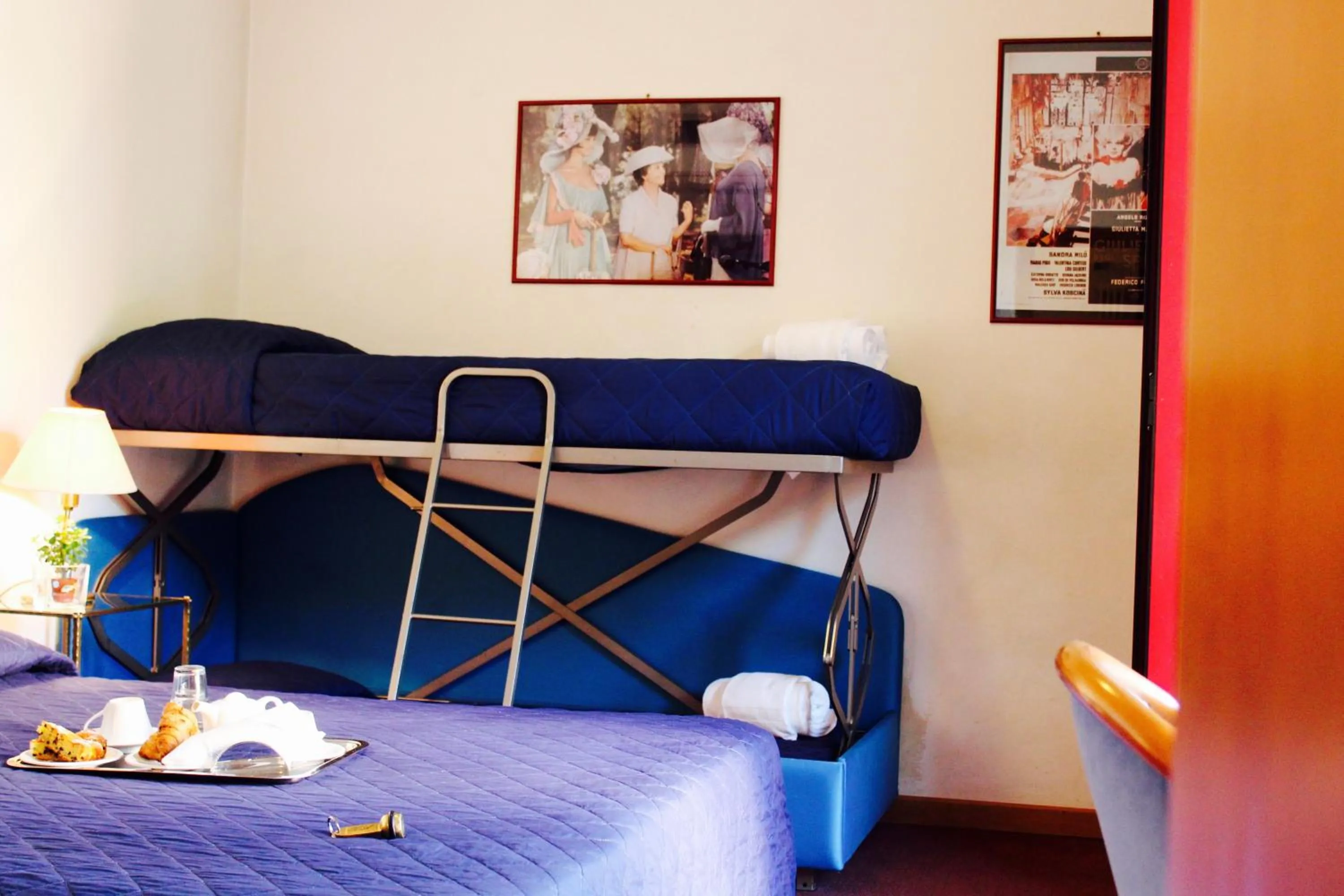 Bed in Arcangelo Roof Hotel