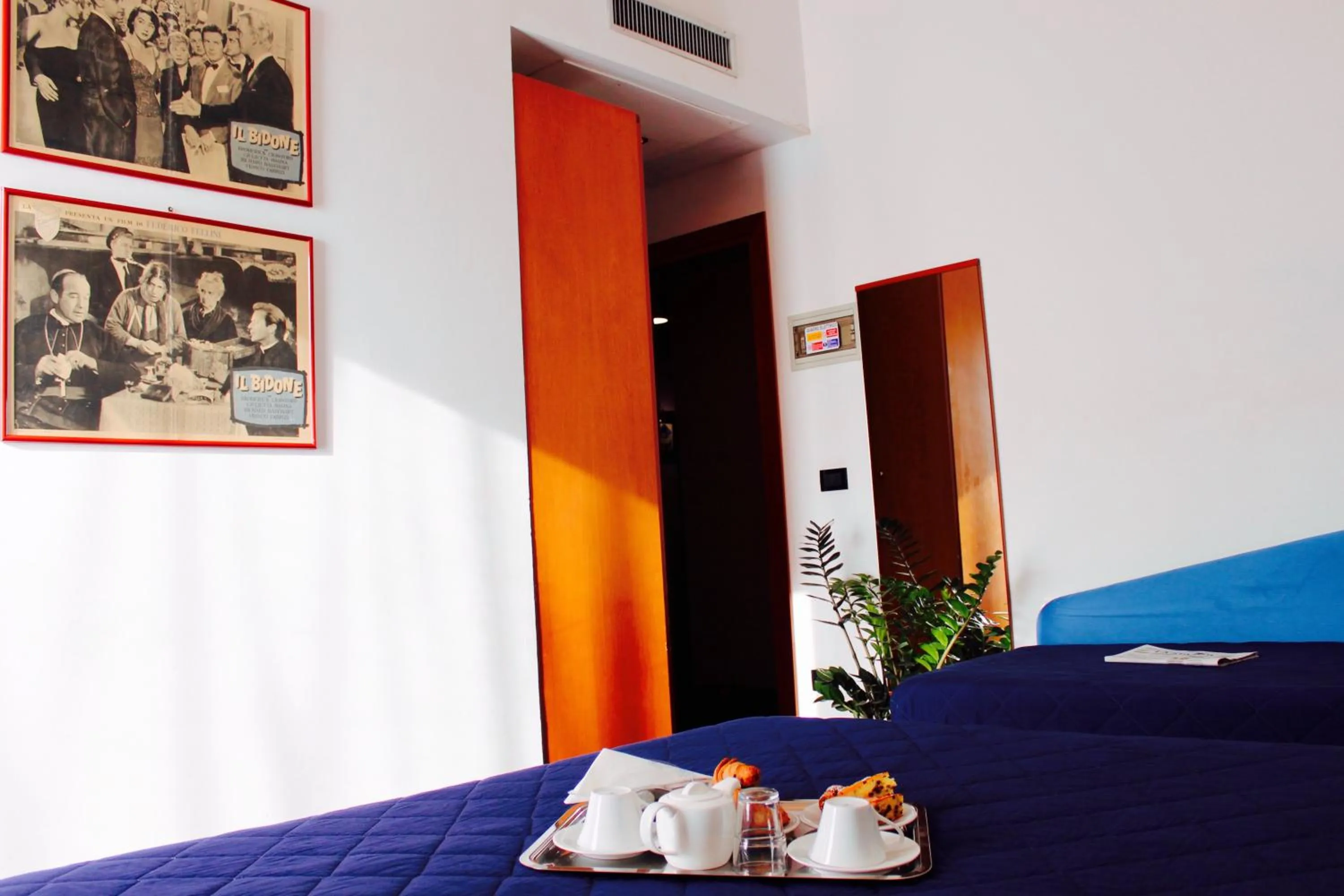 Bed in Arcangelo Roof Hotel